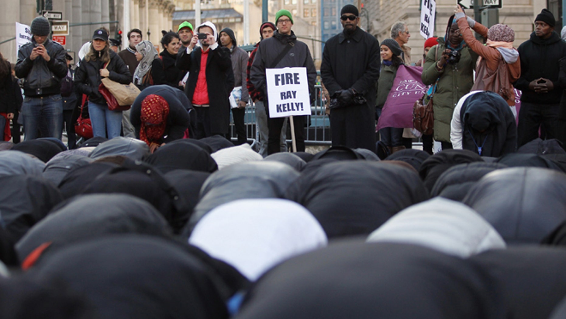 Muslims pray in Foley Square during a protest of ethnic profiling on November 18, 2011 in New York City.