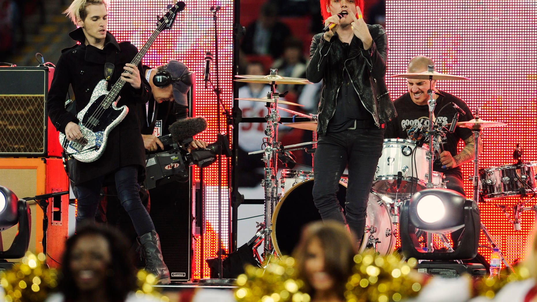 In this Oct. 31, 2010 file photo, My Chemical Romance performs during the pre-game show for the NFL Football game between the Denver Broncos and San Francisco 49ers at Wembley Stadium in London.