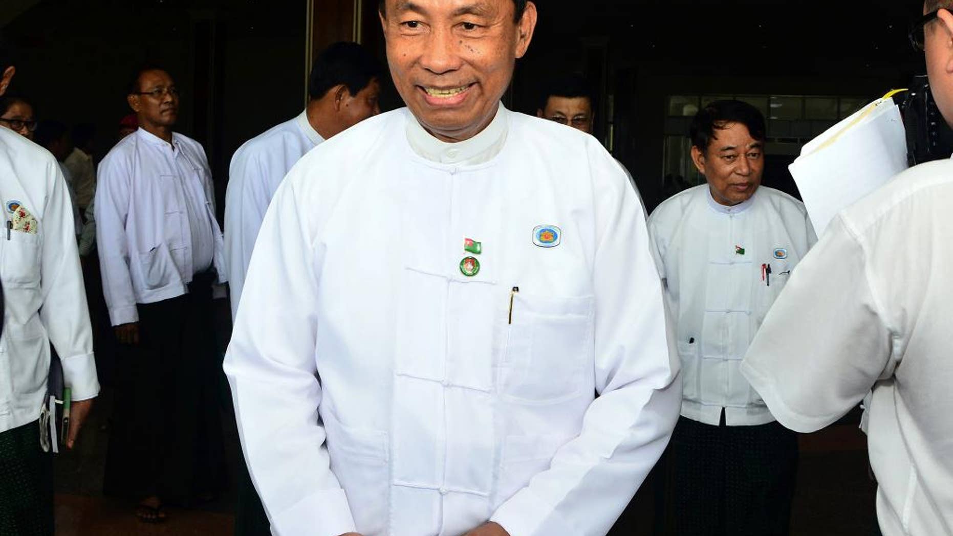 In this Wednesday, Aug 12, 2015, photo, Myanmar's Parliament speaker Shwe Mann leaves after a press conference at the Union Solidarity and Development Party headquarters in Naypyitaw, Myanmar. Security forces have seized control of the headquarters of Myanmar's ruling party as rifts between party members intensified ahead of upcoming general elections, witnesses said Thursday. (AP Photo/Aung Shine Oo)