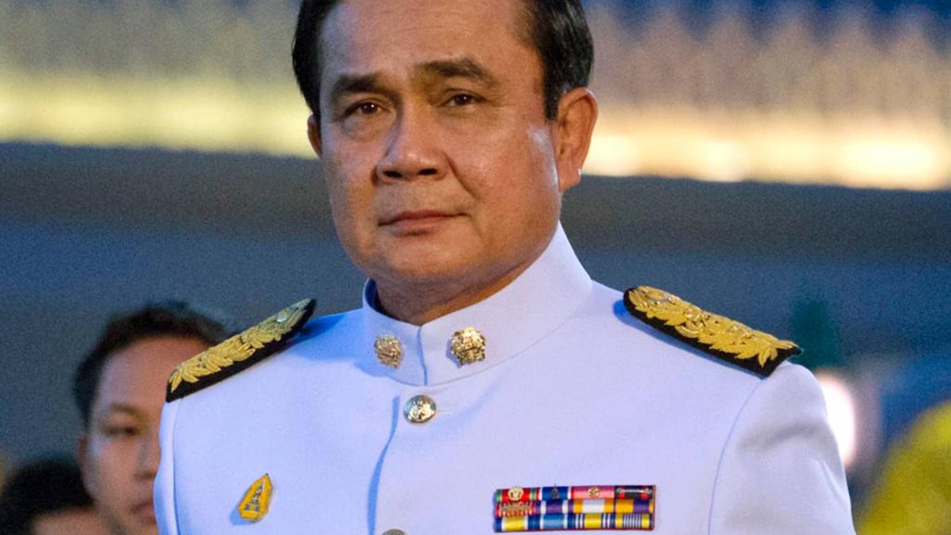 FILE - In this Sept. 4, 2014 file photo, Thailand's Prime Minister Gen. Prayuth Chan-ocha arrives at the government house in Bangkok, Thailand. Thailand's appointed Prime Minister Prayuth makes his first official overseas trip Thursday, Oct. 9, 2014 since seizing power in a military coup. (AP Photo/Sakchai Lalit, File)