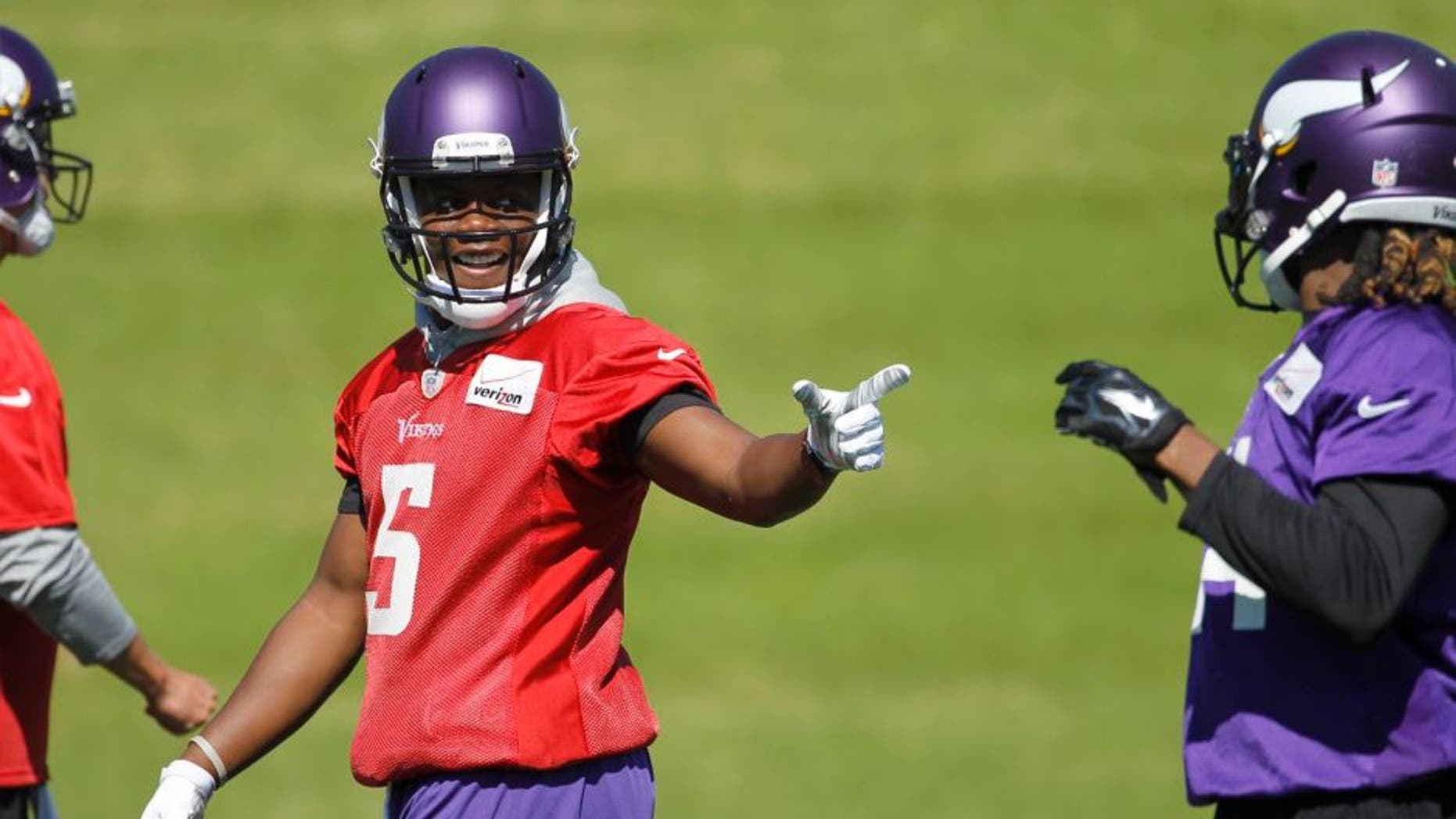 Tuesday, June 16: Minnesota Vikings quarterback Teddy Bridgewater (left) talks with wide receiver Cordarrelle Patterson during minicamp in Eden Prairie, Minn.