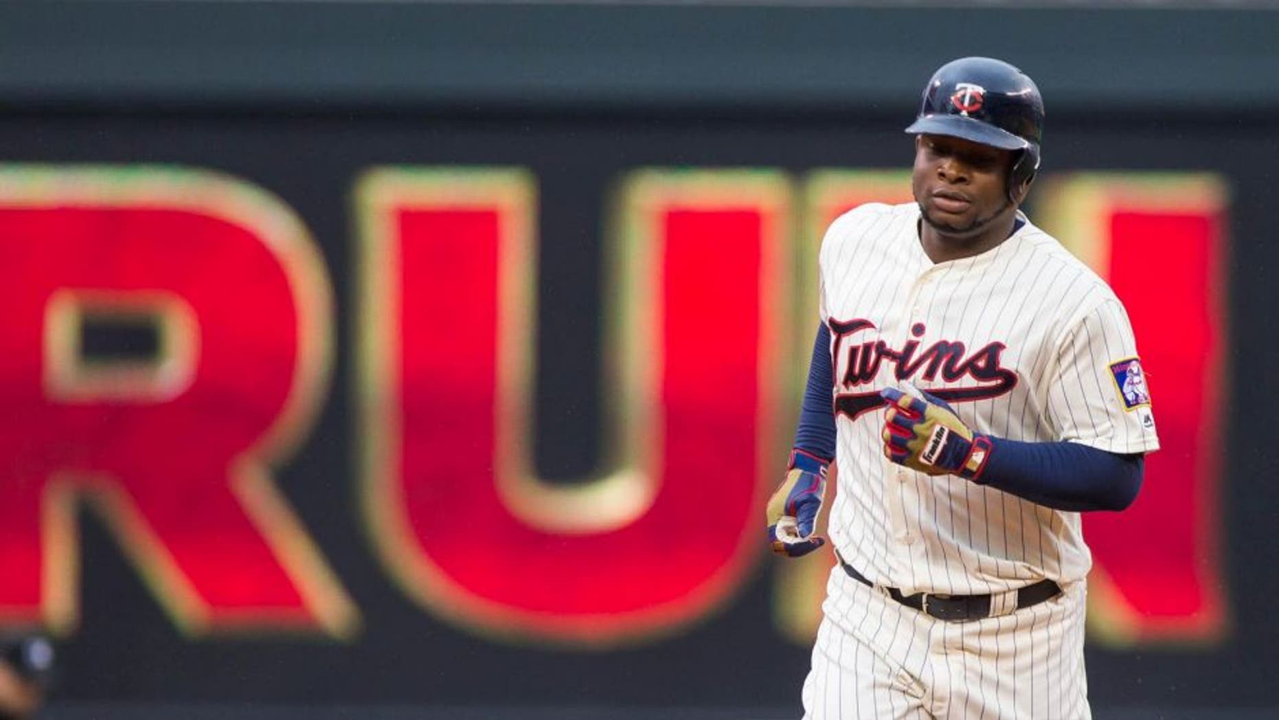 Wednesday, May 11, 2016: Minnesota Twins outfielder Miguel Sano rounds the bases on his 23rd birthday after hitting a home run in the second inning against the Baltimore Orioles at Target Field.