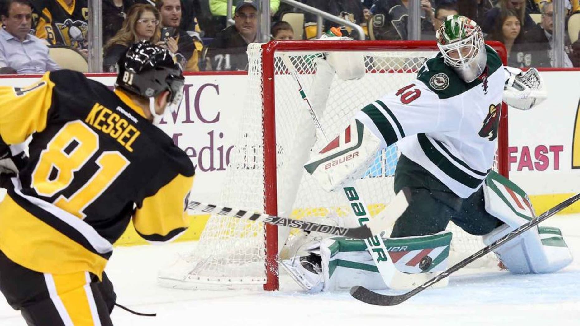 Tuesday, Nov. 17: Minnesota Wild goalie Devan Dubnyk makes a save against Pittsburgh Penguins right wing Phil Kessel during the second period at the CONSOL Energy Center in Pittsburgh, Penn.