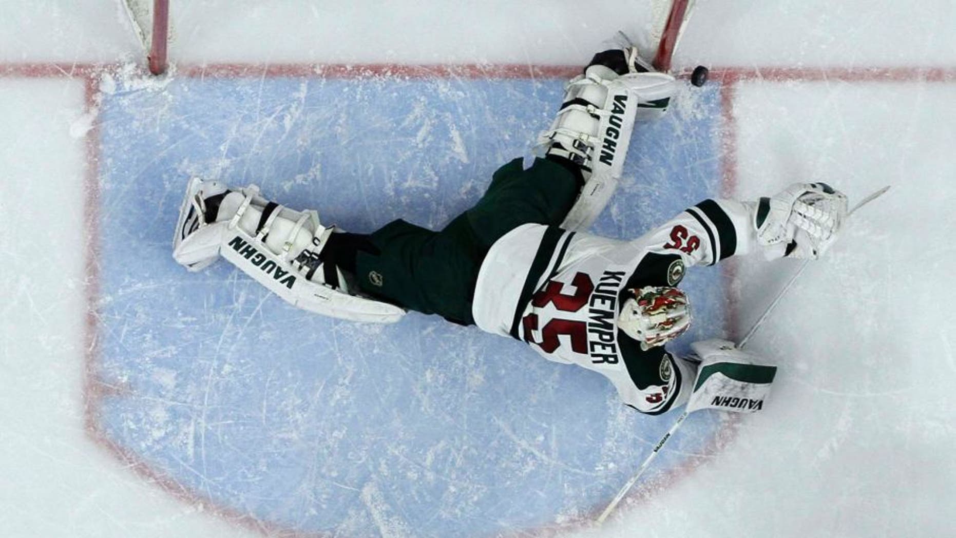 Thursday, November 20: The Minnesota Wild's Darcy Kuemper blocks a shot during the second period against the Philadelphia Flyers. The Wild won 3-2.