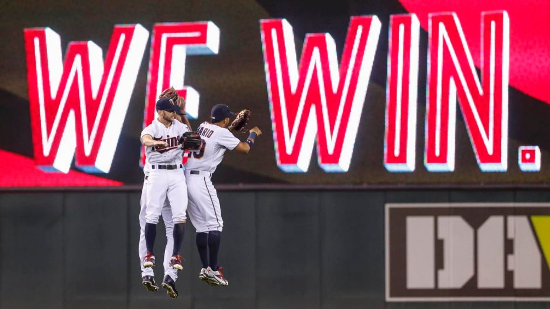 Friday, Aug. 28: Minnesota Twins left fielder Shane Robinson (left), center fielder Byron Buxton (back) and right fielder Eddie Rosario celebrate the 3-0 win over the Houston Astros at Target Field.