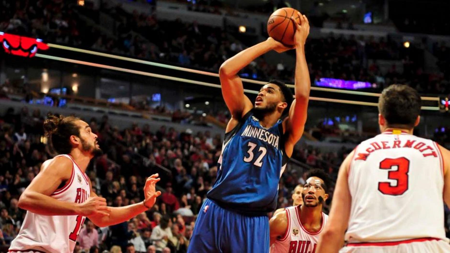 Saturday, Nov. 7: Minnesota Timberwolves center Karl-Anthony Towns shoots over Chicago Bulls center Joakim Noah during the second half at the United Center. Minnesota won 102-93 in overtime.