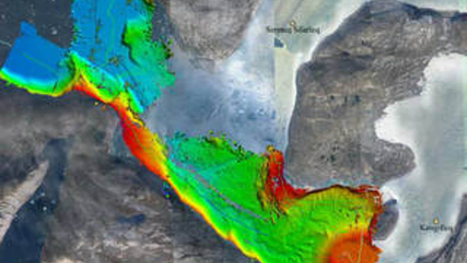 Seafloor depths on Greenland's west coast, measured by sonar aboard a research ship as part of the OMG project. Red and yellow are shallower areas, greens and blues deeper. The thin green line is the ship's path. The data give a better idea of where warm ocean water can reach glaciers.