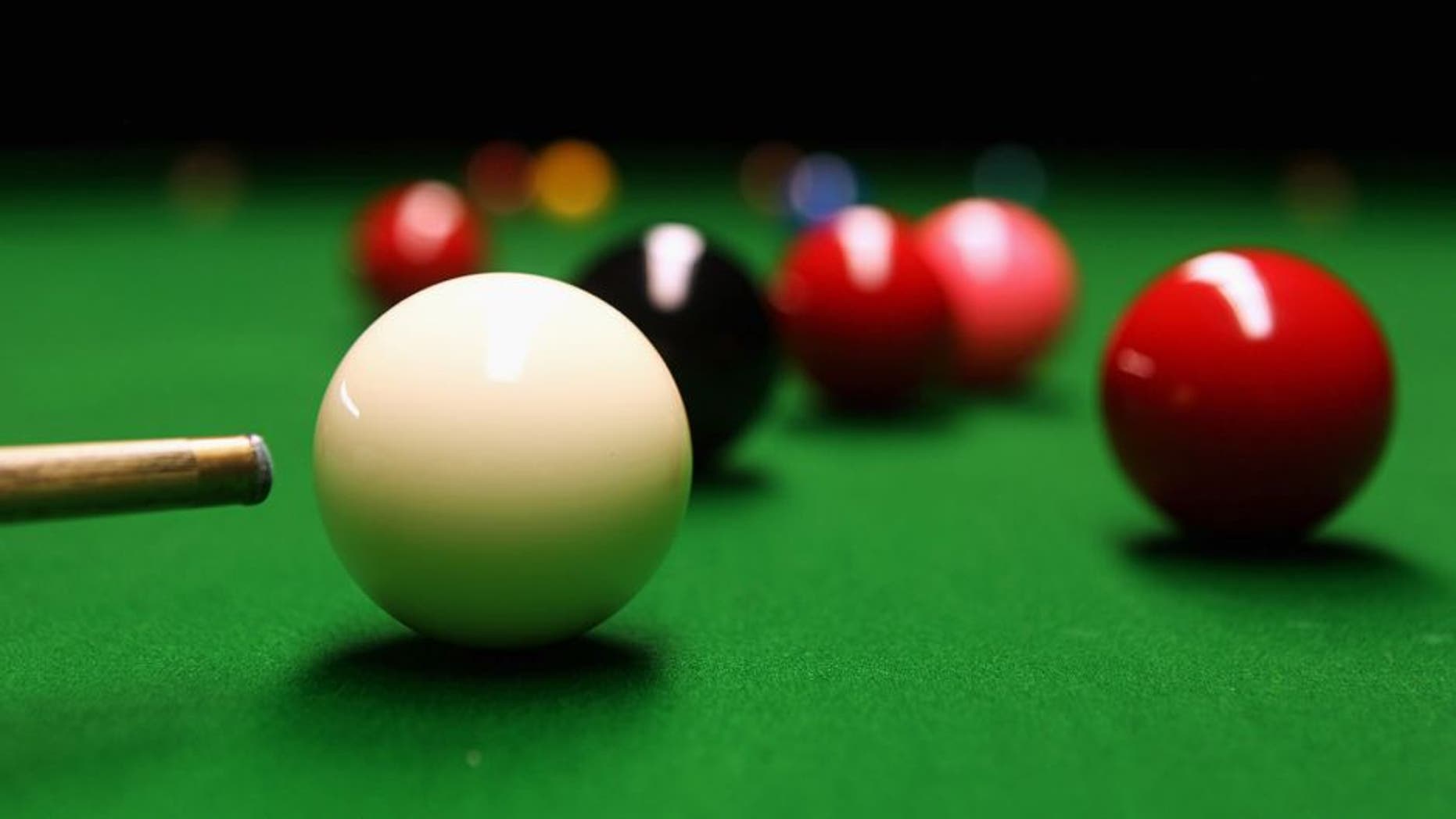 LONDON, ENGLAND - JANUARY 15: A detailed view of a cue and snooker balls shot in the practice room during The Ladbrokesmobile Masters on Day 7 at Wembley Arena on January 15, 2011 in London, England. (Photo by Dean Mouhtaropoulos/Getty Images)