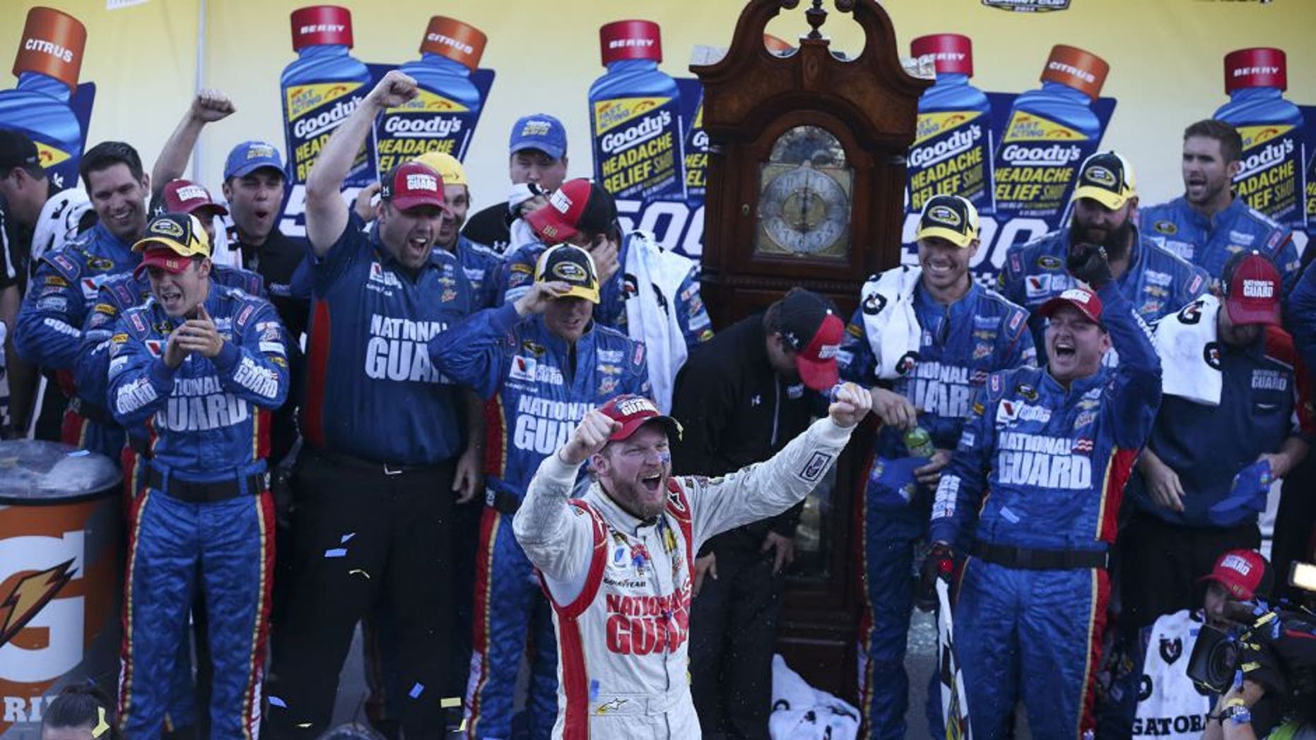 Dale Earnhardt Jr., driver of the #88 National Guard Chevrolet, celebrates in victory lane after winning during the NASCAR Sprint Cup Series Goody's Headache Relief Shot 500 at Martinsville Speedway on October 26, 2014 in Martinsville, Virginia.