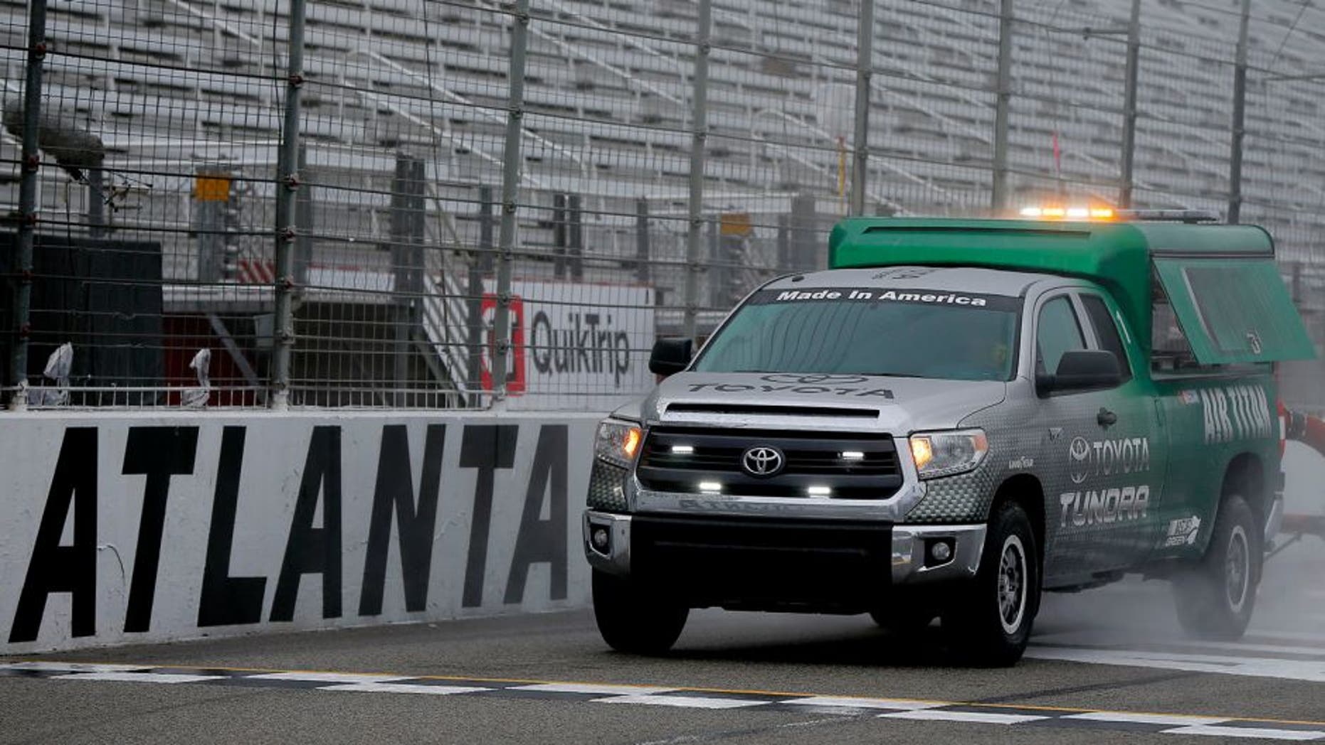 HAMPTON, GA - MARCH 01: A NASCAR Air Titan 2.0 drys the track prior to the NASCAR Sprint Cup Series Folds of Honor QuikTrip 500 at Atlanta Motor Speedway on March 1, 2015 in Hampton, Georgia. (Photo by Matt Sullivan/NASCAR via Getty Images)