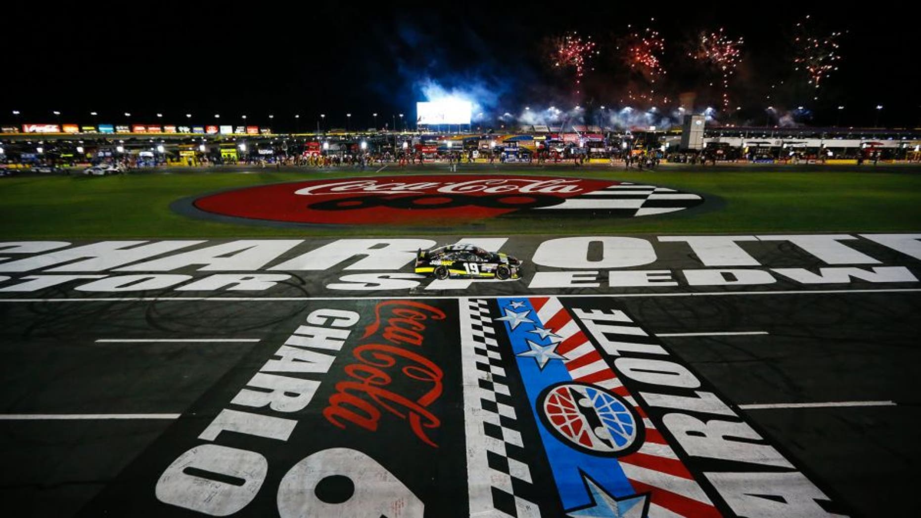 Carl Edwards, driver of the #19 Subway Toyota, celebrates with a burnout after winning during the NASCAR Sprint Cup Series Coca-Cola 600 at Charlotte Motor Speedway on May 24, 2015 in Charlotte, North Carolina.