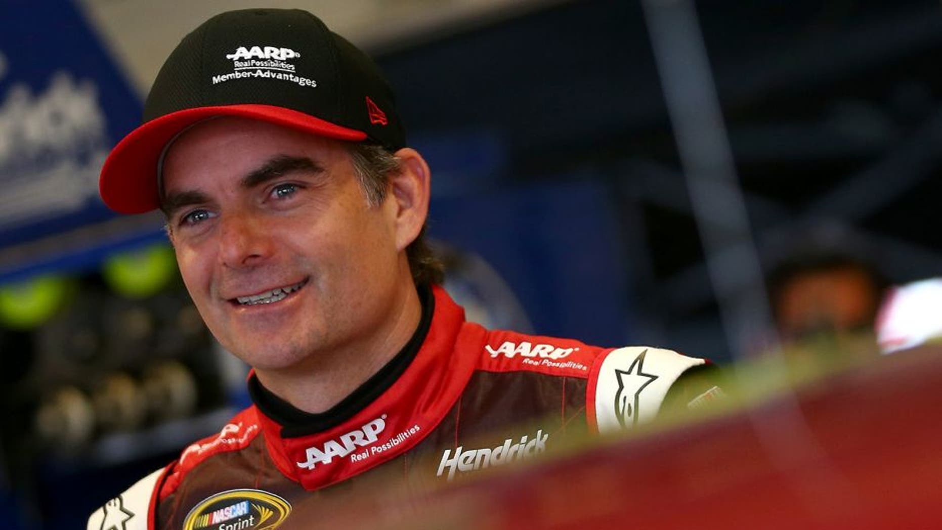 SPARTA, KY - JULY 10: Jeff Gordon, driver of the #24 AARP Member Advantages Chevrolet, looks on in the garage area during practice for the NASCAR Sprint Cup Series Quaker State 400 Presented by Advance Auto Parts at Kentucky Speedway on July 10, 2015 in Sparta, Kentucky. (Photo by Sarah Crabill/Getty Images)