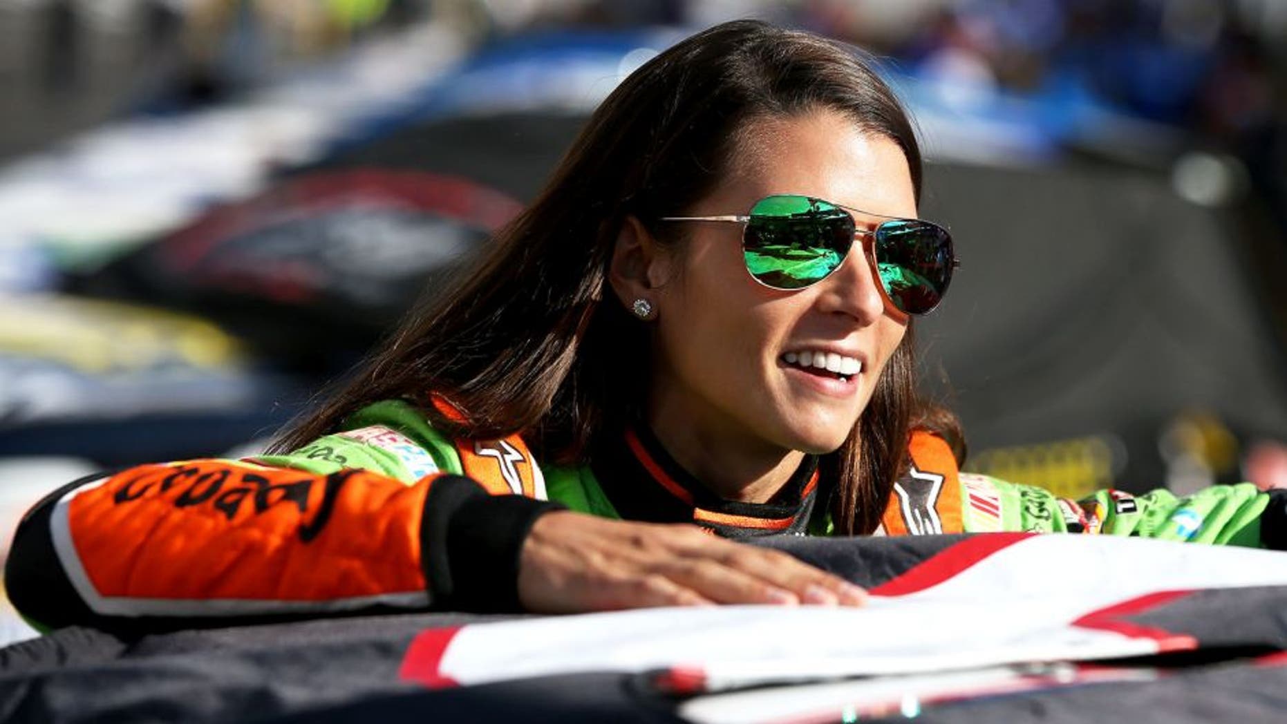 BRISTOL, TN - AUGUST 21: Danica Patrick, driver of the #10 GoDaddy Chevrolet, stands on the grid during qualifying for the NASCAR Sprint Cup Series Irwin Tools Night Race at Bristol Motor Speedway on August 21, 2015 in Bristol, Tennessee. (Photo by Sean Gardner/Getty Images)