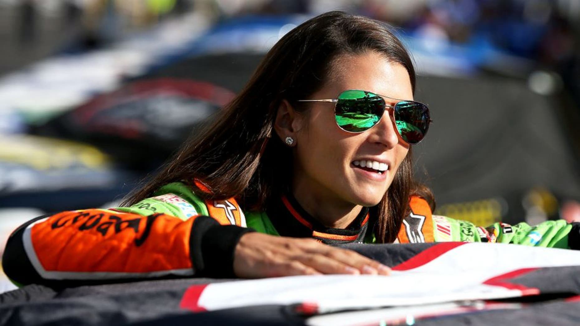 BRISTOL, TN - AUGUST 21: Danica Patrick, driver of the #10 GoDaddy Chevrolet, stands on the grid during qualifying for the NASCAR Sprint Cup Series Irwin Tools Night Race at Bristol Motor Speedway on August 21, 2015 in Bristol, Tennessee. (Photo by Sean Gardner/Getty Images)
