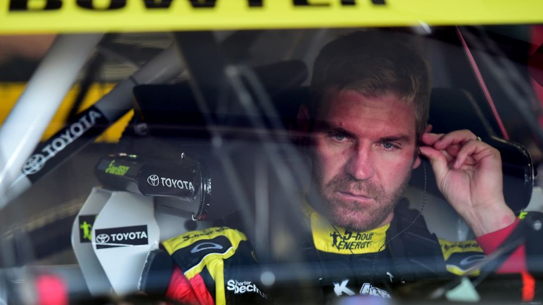 LOUDON, NH - SEPTEMBER 26: Clint Bowyer, driver of the #15 5-Hour Energy Toyota, sits in his car during practice for the NASCAR Sprint Cup Series Sylvania 300 at New Hampshire Motor Speedway on September 26, 2015 in Loudon, New Hampshire. (Photo by Jared C. Tilton/Getty Images)