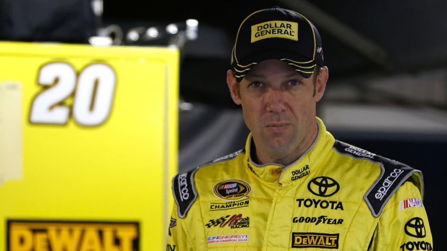 MARTINSVILLE, VA - OCTOBER 31: Matt Kenseth, driver of the #20 Dollar General Toyota, stands in the garage area during practice for the NASCAR Sprint Cup Series Goody's Headache Relief Shot 500 at Martinsville Speedway on October 31, 2015 in Martinsville, Virginia. (Photo by Jeff Zelevansky/Getty Images)