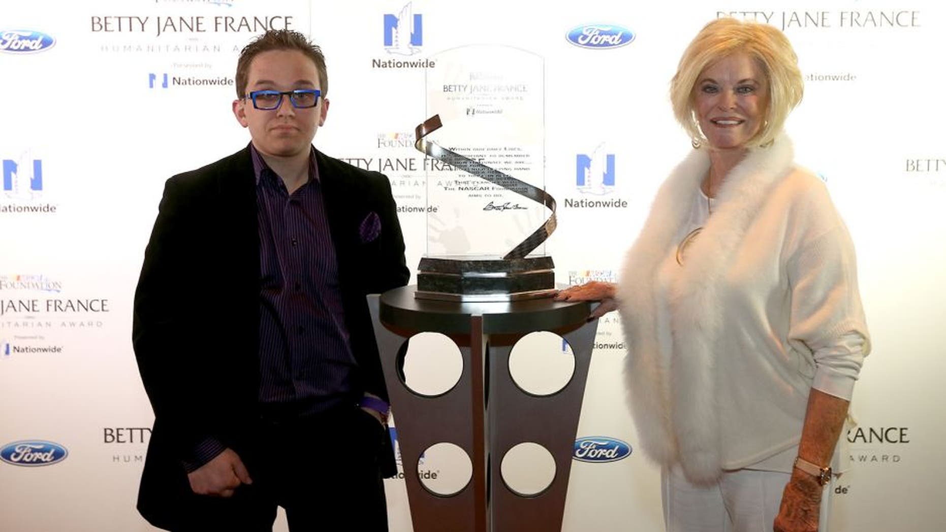 LAS VEGAS, NV - DECEMBER 02: Betty Jane France poses with Jeff Hanson of Overland Park, Kansas, who represents the Children's Tumor Foundation, during the Betty Jane France Humanitarian Award Reception inside Wynn Las Vegas during NASCAR Champion's Week on December 2, 2015 in Las Vegas, Nevada. (Photo by Chris Graythen/NASCAR via Getty Images)