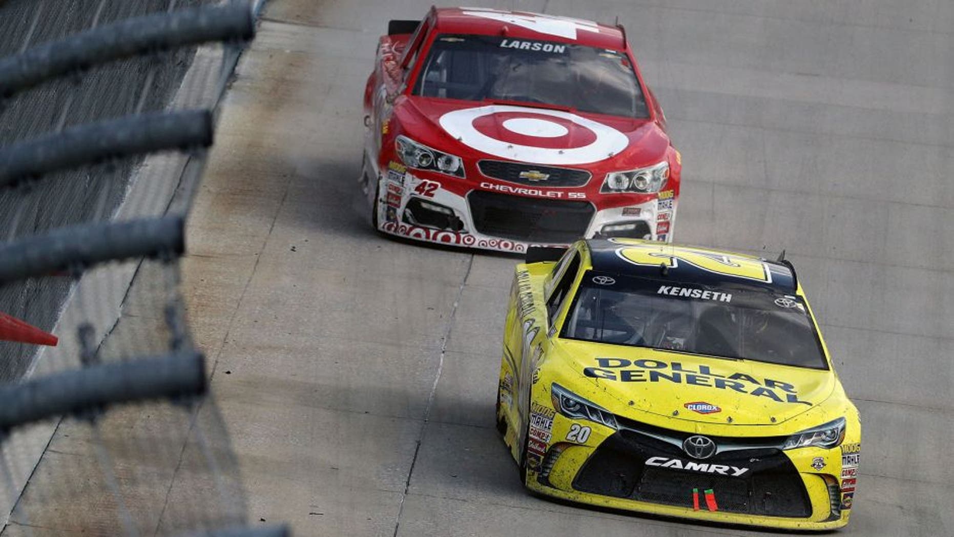 DOVER, DE - MAY 15: Matt Kenseth, driver of the #19 Stanley Toyota, leads Kyle Larson, driver of the #42 Target Chevrolet, during the NASCAR Sprint Cup Series AAA 400 Drive for Autism at Dover International Speedway on May 15, 2016 in Dover, Delaware. (Photo by Patrick Smith/Getty Images)