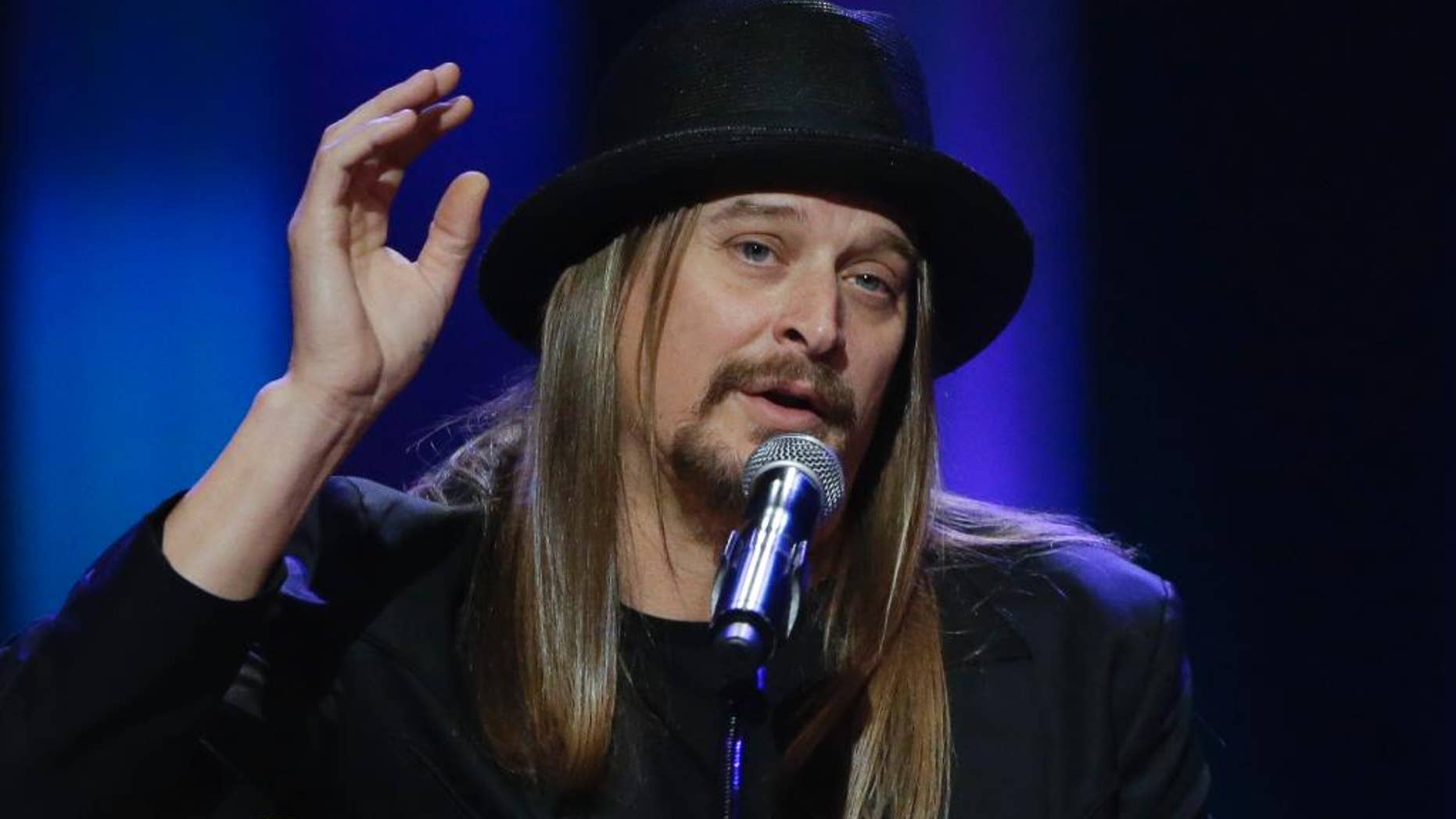 FILE - This May 2, 2013, file photo shows Kid Rock speaking during the funeral for country music star George Jones at the Grand Ole Opry House in Nashville, Tenn. Kid Rock will perform a pre-race concert at the Daytona 500 in February. Daytona International Speedway said Friday, Dec. 19, 2014, he will play several hits as well as new single "First Kiss." (AP Photo/Mark Humphrey, Pool)