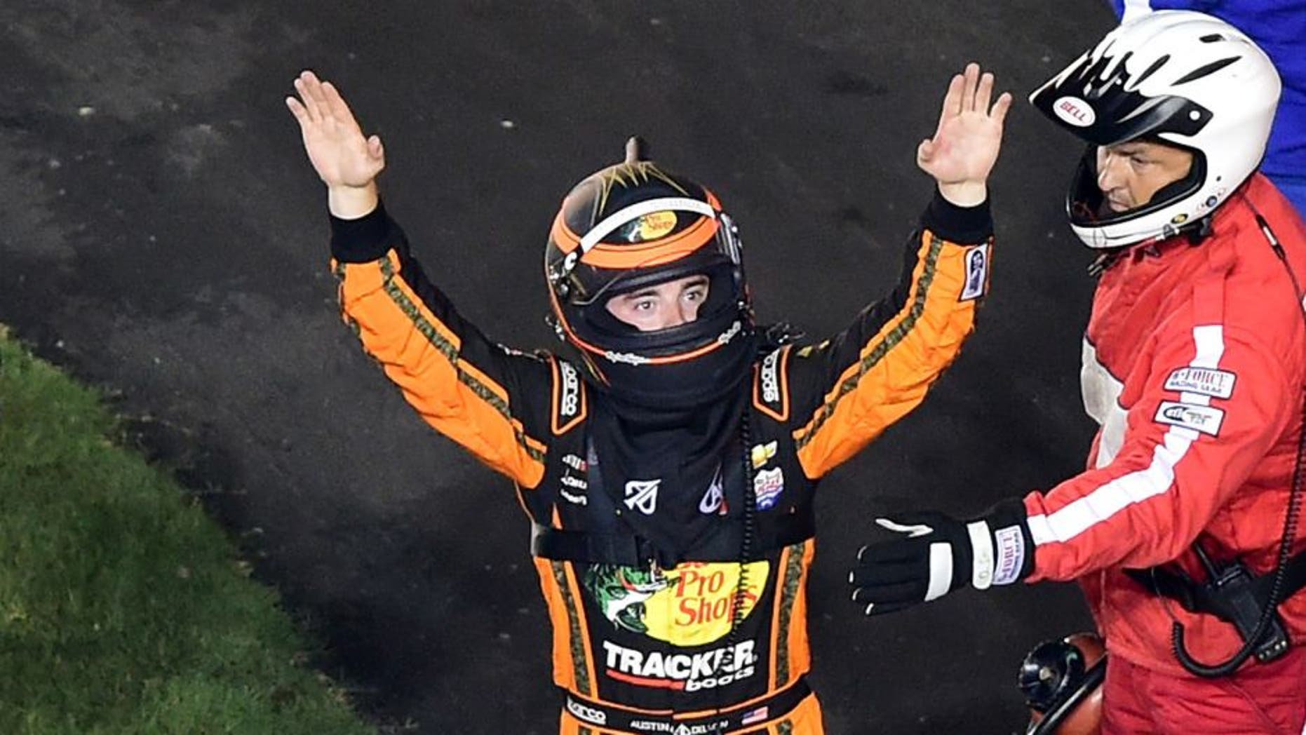 DAYTONA BEACH, FL - JULY 06: Austin Dillon, driver of the #3 Bass Pro Shops Chevrolet, gestures to the crowd after being involved in an on-track incident during the NASCAR Sprint Cup Series Coke Zero 400 Powered by Coca-Cola at Daytona International Speedway on July 6, 2015 in Daytona Beach, Florida. (Photo by Jared C. Tilton/NASCAR via Getty Images)