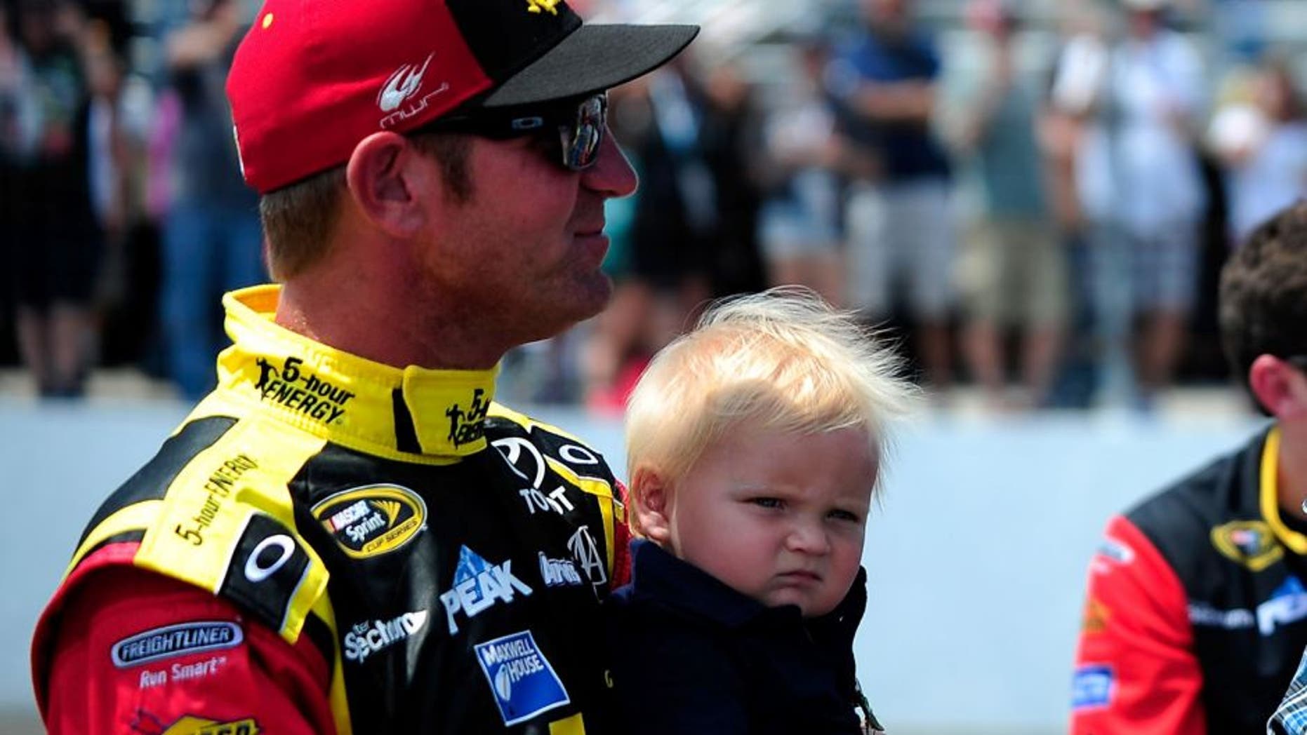 LOUDON, NH - JULY 19: Music artist Blake Shelton and Clint Bowyer, driver of the #15 5-Hour Energy Toyota, talk on pit road prior to the NASCAR Sprint Cup Series 5-Hour ENERGY 301 at New Hampshire Motor Speedway on July 19, 2015 in Loudon, New Hampshire. (Photo by Jeff Curry/Getty Images)