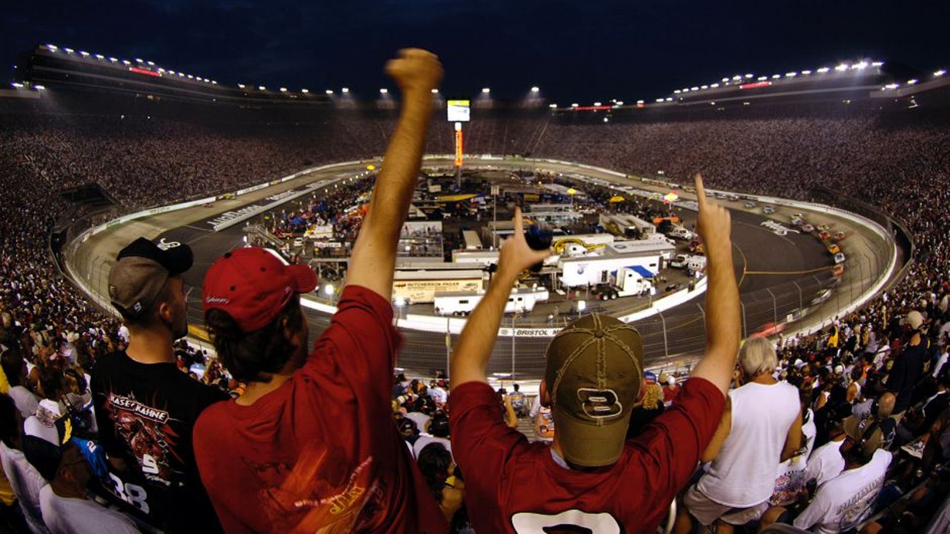 BRISTOL, TN - AUGUST 27: Fans react to a pass by Dale Earnhardt Jr., driver of the #8 Budweiser Chevrolet, during the NASCAR Nextel Cup Series Sharpie 500 on August 27, 2005 at the Bristol Motor Speedway in Bristol, Tennessee. (Photo by Rusty Jarrett/Getty Images)