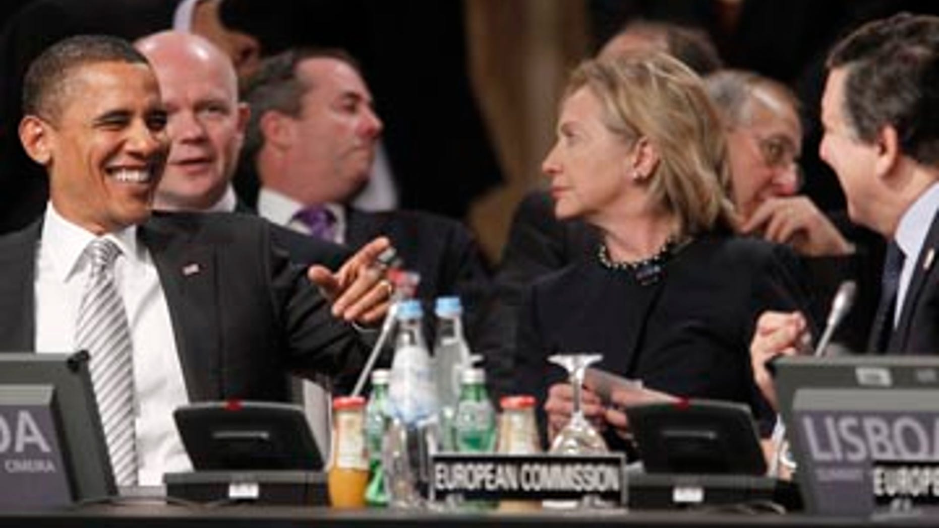 Saturday: Secretary of State Hillary Clinton and President Obama at the Afghanistan Opening Session at the NATO Summit in Lisbon, Portugal.
