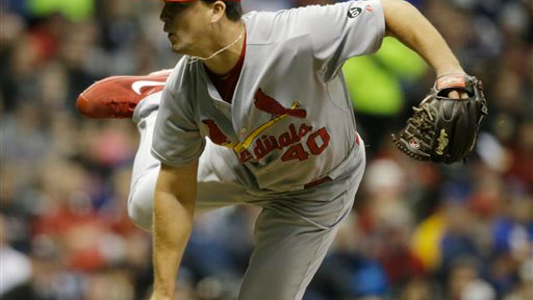 St. Louis Cardinals' Mitch Harris pitches to the Milwaukee Brewers during the fifth inning of a baseball game Saturday, April 25, 2015, in Milwaukee. (AP Photo/Jeffrey Phelps)