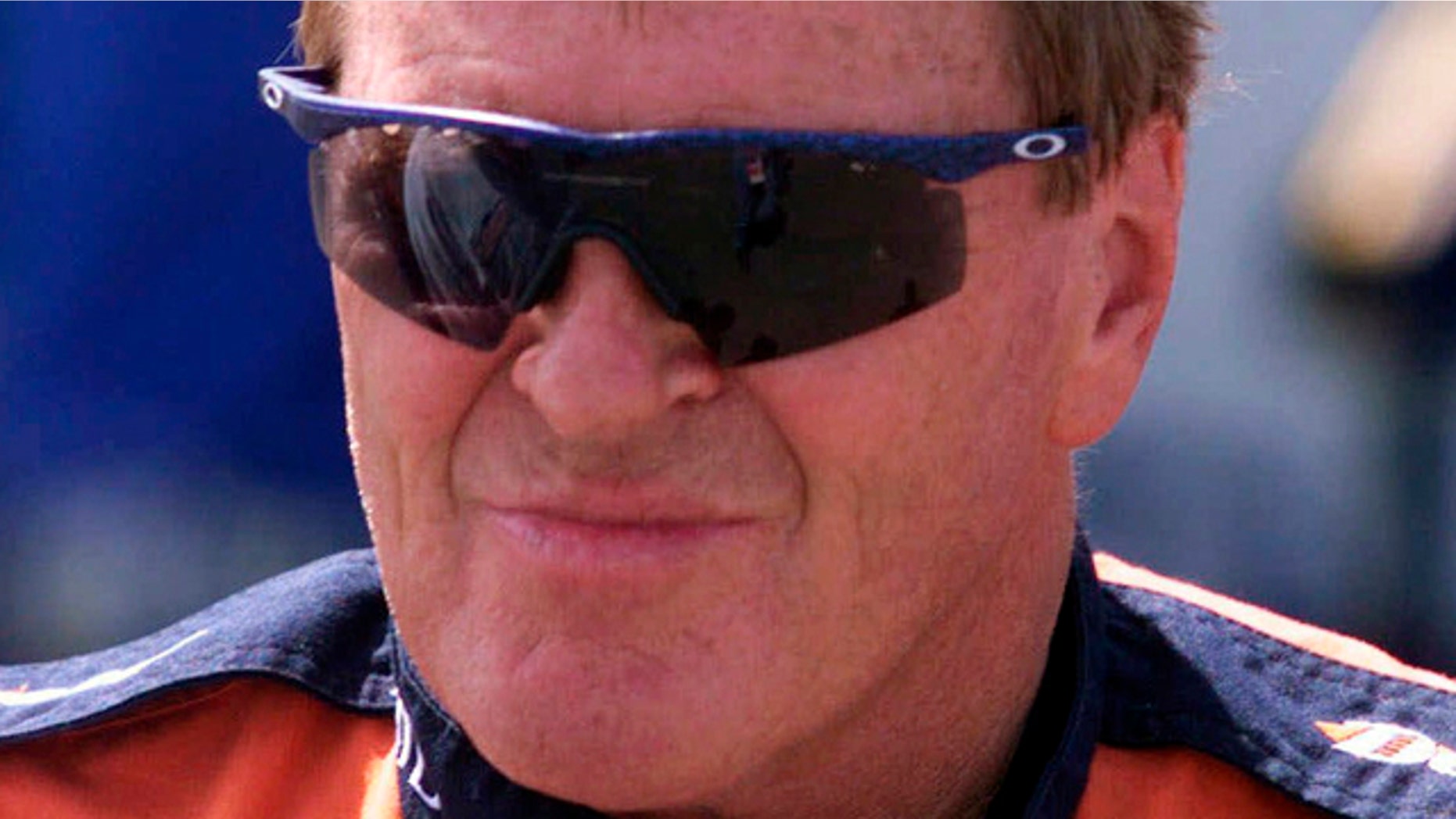 NASCAR driver Dick Trickle speaks to fans after qualifying on the pole position the NASCAR Busch series auto race at Dover Downs in Dover, Del.