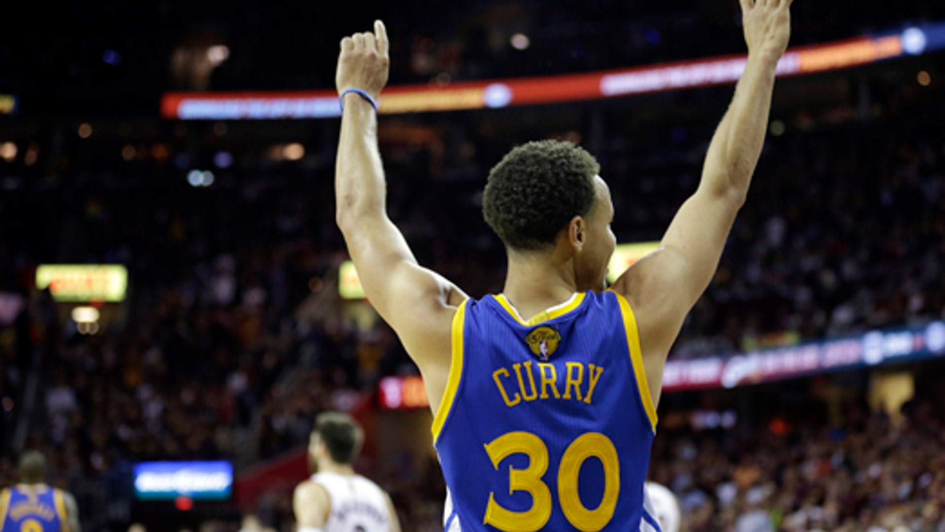 June 16, 2015: Golden State Warriors guard Stephen Curry (30) celebrates during the second half of Game 6 of basketball's NBA Finals against the Cleveland Cavaliers in Cleveland. The Warriors defeated the Cavaliers 105-97 to win the best-of-seven game series 4-2. (AP Photo/Tony Dejak)