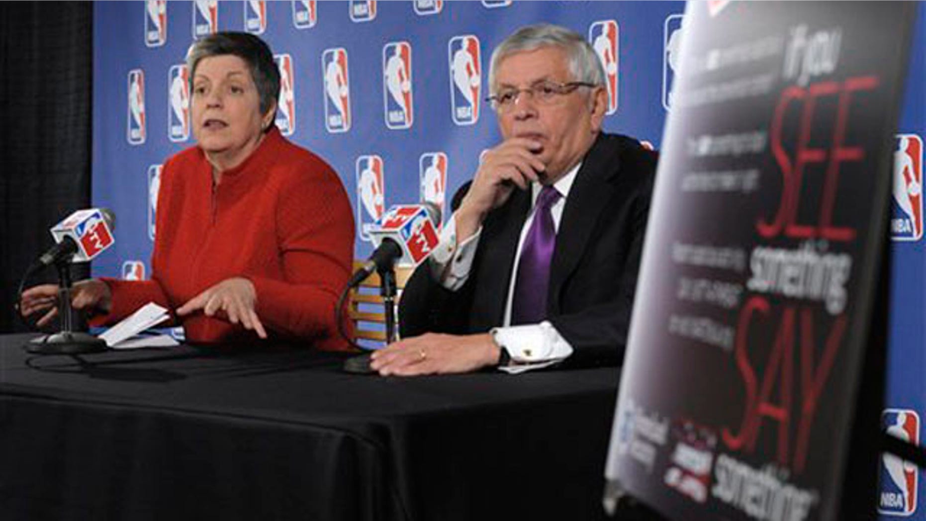 Homeland Security Secretary Janet Napolitano, left, accompanied by NBA Commissioner David Stern, speaks during a news conference at the Verizon Center in Washington, Tuesday, Feb. 15, 2011, to discuss her department's ongoing collaboration with the nation's sports industry.