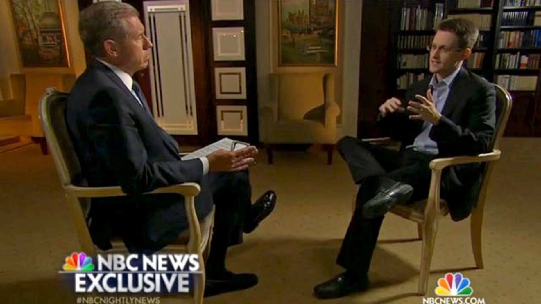 May 27, 2014: In this image taken from video provided by NBC News Edward Snowden, a former National Security Agency (NSA) contractor, right, speaks to NBC News anchor Brian Williams, left, during an NBC Exclusive interview. Snowden told Williams that he worked undercover and overseas for the CIA and the NSA. (AP Photo/NBC News)