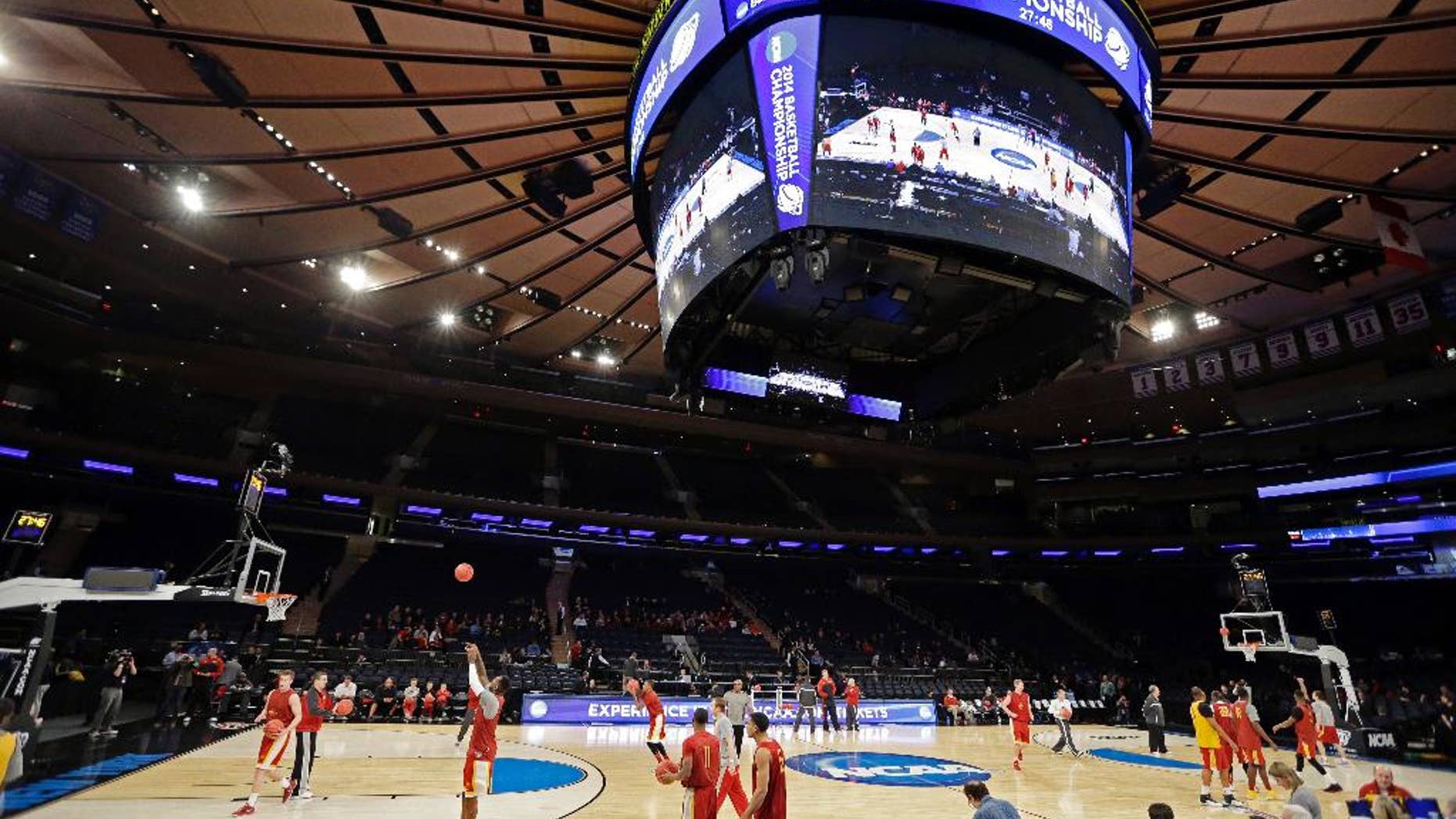 Iowa State's basketball team warms up during practice at the NCAA college basketball tournament Thursday, March 27, 2014, in New York. Iowa State will play Connecticut in a regional semifinal on Thursday. (AP Photo/Frank Franklin II)