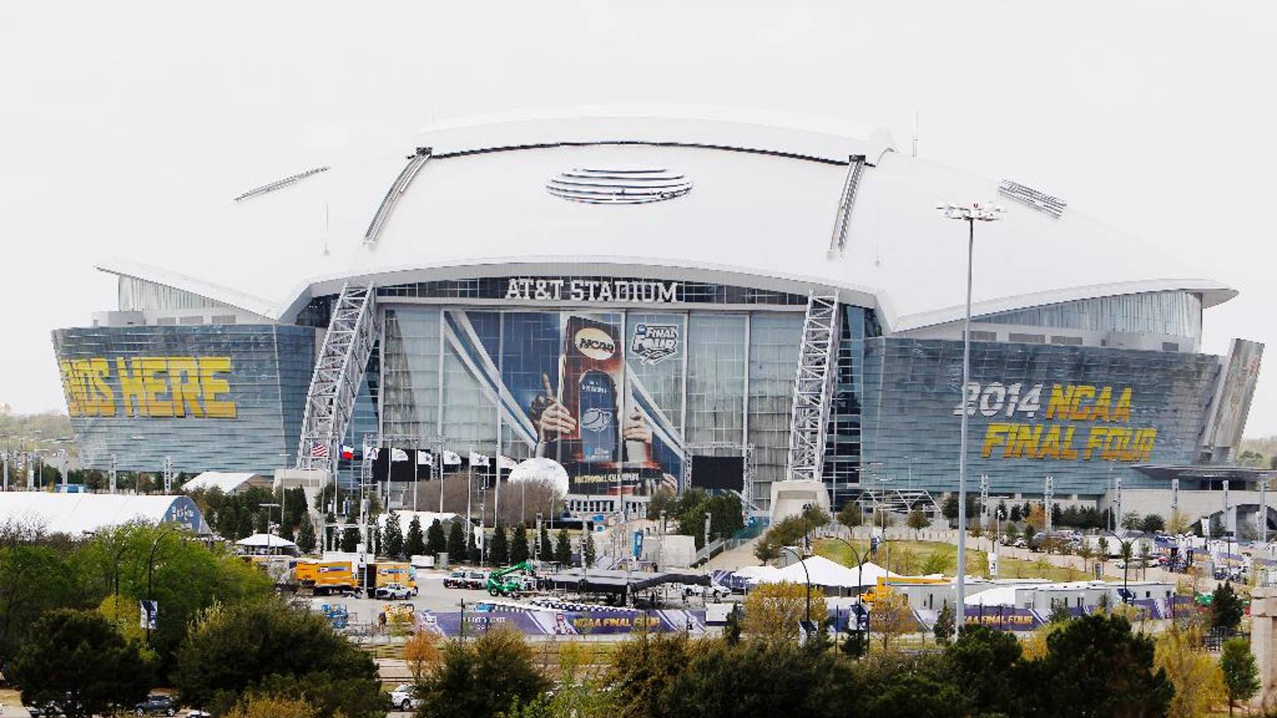 AT&T stadium, host of the 2014 NCAA Final Four, is seen from Globe Life Park Monday, March 31, 2014, in Arlington, Texas. Welcome to the NCAA Final Four in North Texas. Enjoy all the parties in Dallas and Sundance Square in Fort Worth, but if you’re going to the games, they are not in Big D. They are at Jerry Jones’ billion-dollar stadium in Arlington, a town of about 370,000 people in between those two downtown's. (AP Photo/Kim Johnson Flodin)
