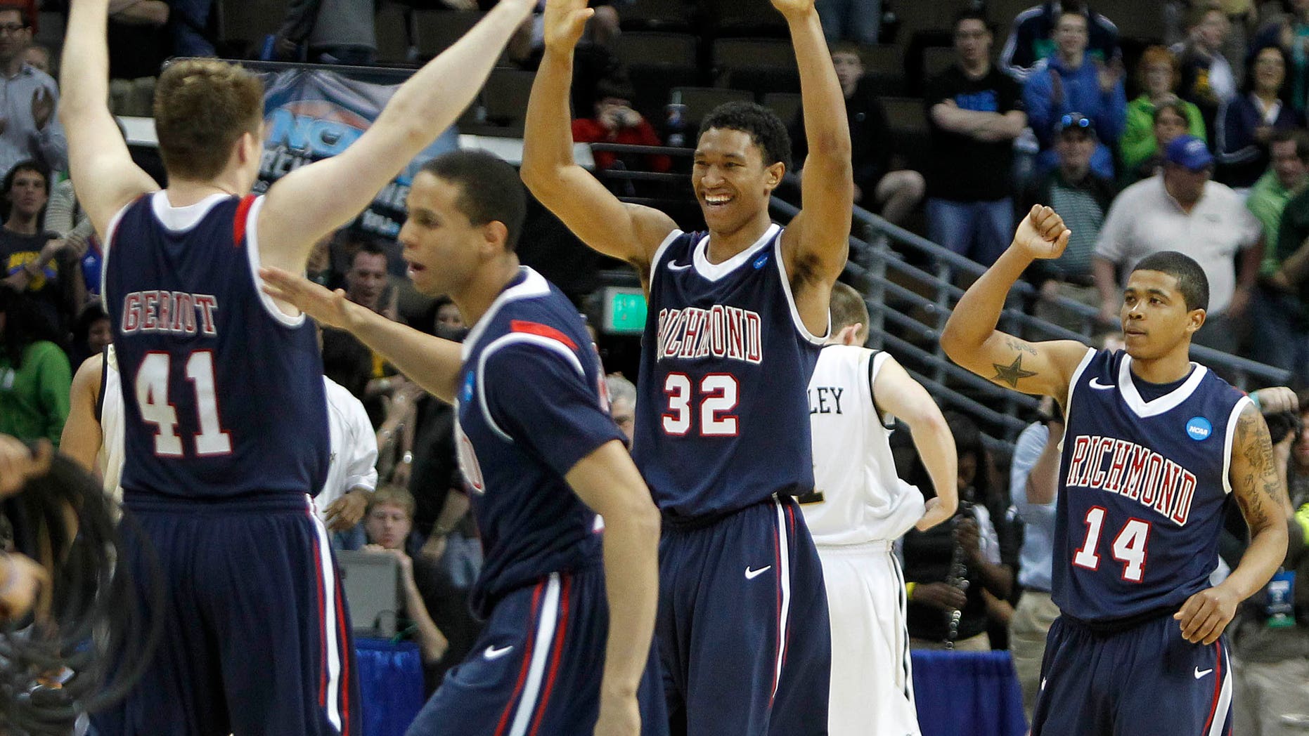 March 17: Richmond's Dan Geriot (41), Justin Harper (32),Francis-Cedric Martel (15) and Kevin Anderson (14) celebrate after their 69-66 win over Vanderbilt in a Southwest regional second round NCAA tournament college basketball game in Denver. (AP)