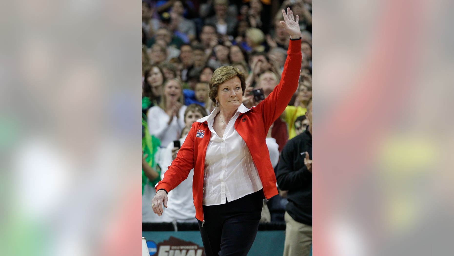 April 1, 2012: Tennessee coach Pat Summitt waves to the crowd during a half-time ceremony to honor past Olympic coaches at an NCAA women's Final Four semifinal college basketball game between the Baylor and the Stanford, in Denver.