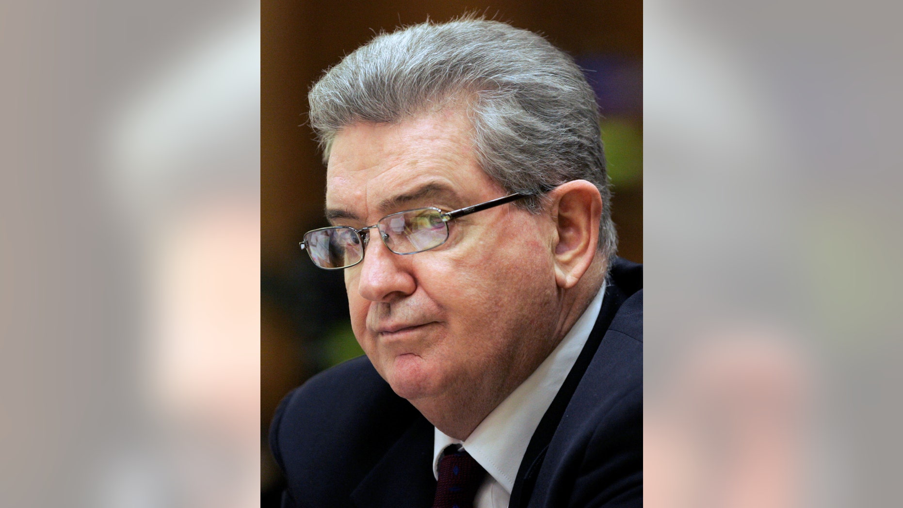 FILE: Former FBI agent John Connolly listens to the testimony in his trial, in Miami, Fla. The 3rd District Court of Appeal ruled Wednesday, May 28, 2014, that former agent John Connolly was improperly convicted and sentenced to 40 years in prison for his role in the 1982 killing of World Jai-Alai President John Callahan.