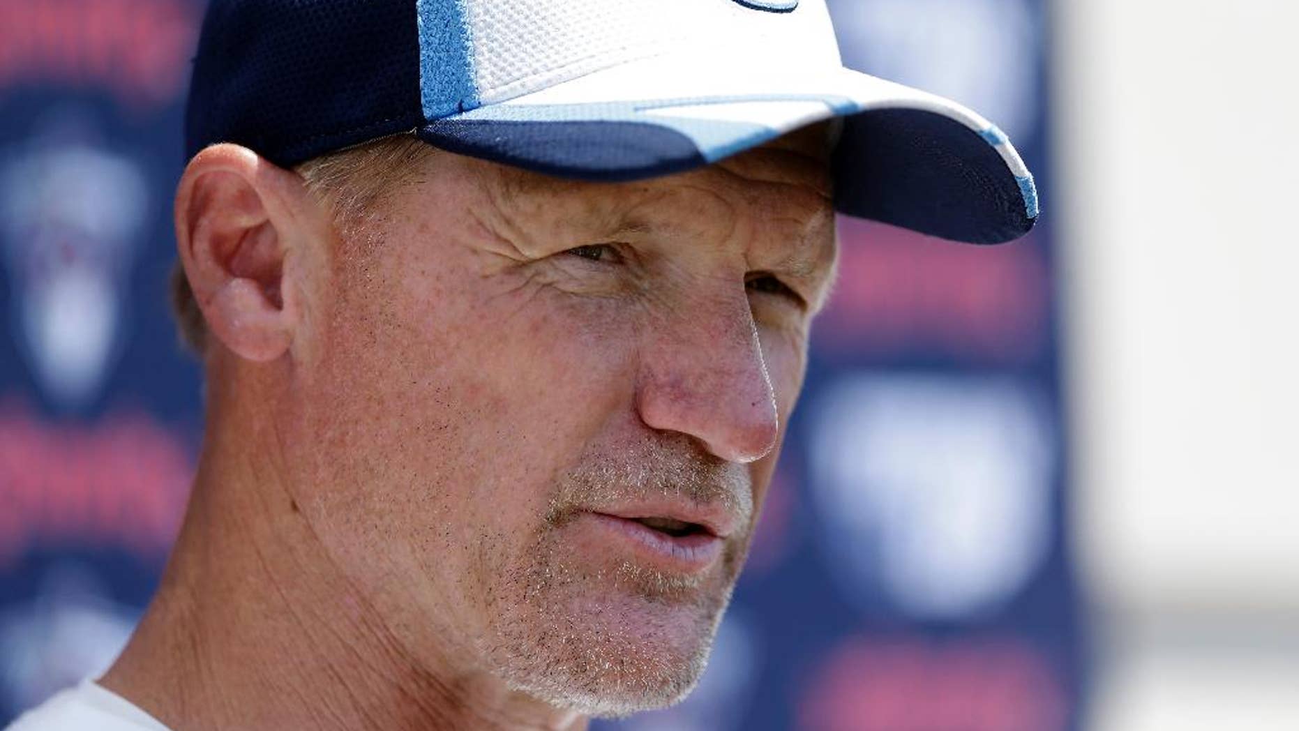 ADVANCE FOR WEEKEND EDITIONS, OCT. 18-19 - FILE - In this July 26, 2014, file photo, Tennessee Titans head coach Ken Whisenhunt answers questions during NFL football training camp in Nashville, Tenn. The Titans (2-4) have two games left before their bye, and two wins would get them back to .500 at 4-4. So first-year coach Whisenhunt has dangled a bit of a carrot for his Titans, according to some of his players. (AP Photo/Mark Humphrey, File)