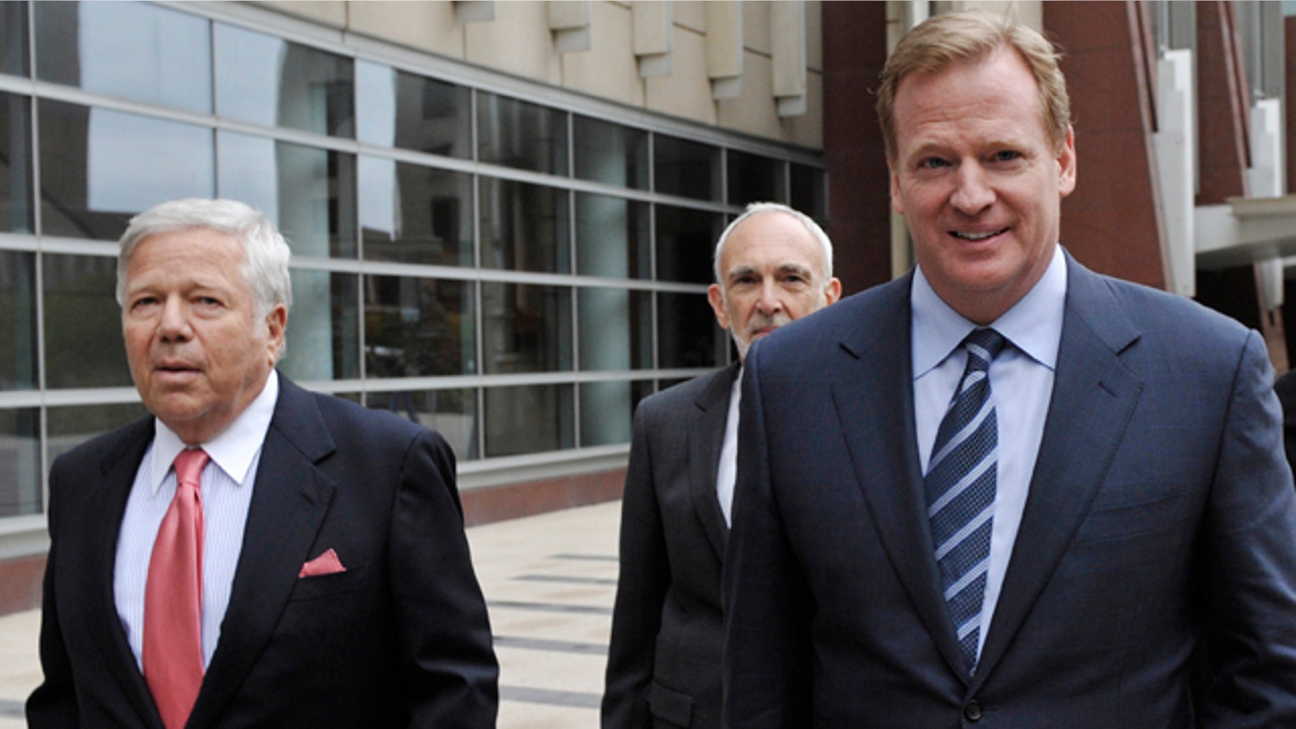 April 14: New England Patriots owner Robert Kraft, left, and NFL commissioner Roger Goodell, right, leave the federal courthouse along with NFL outside attorney Bob Betterman, center.