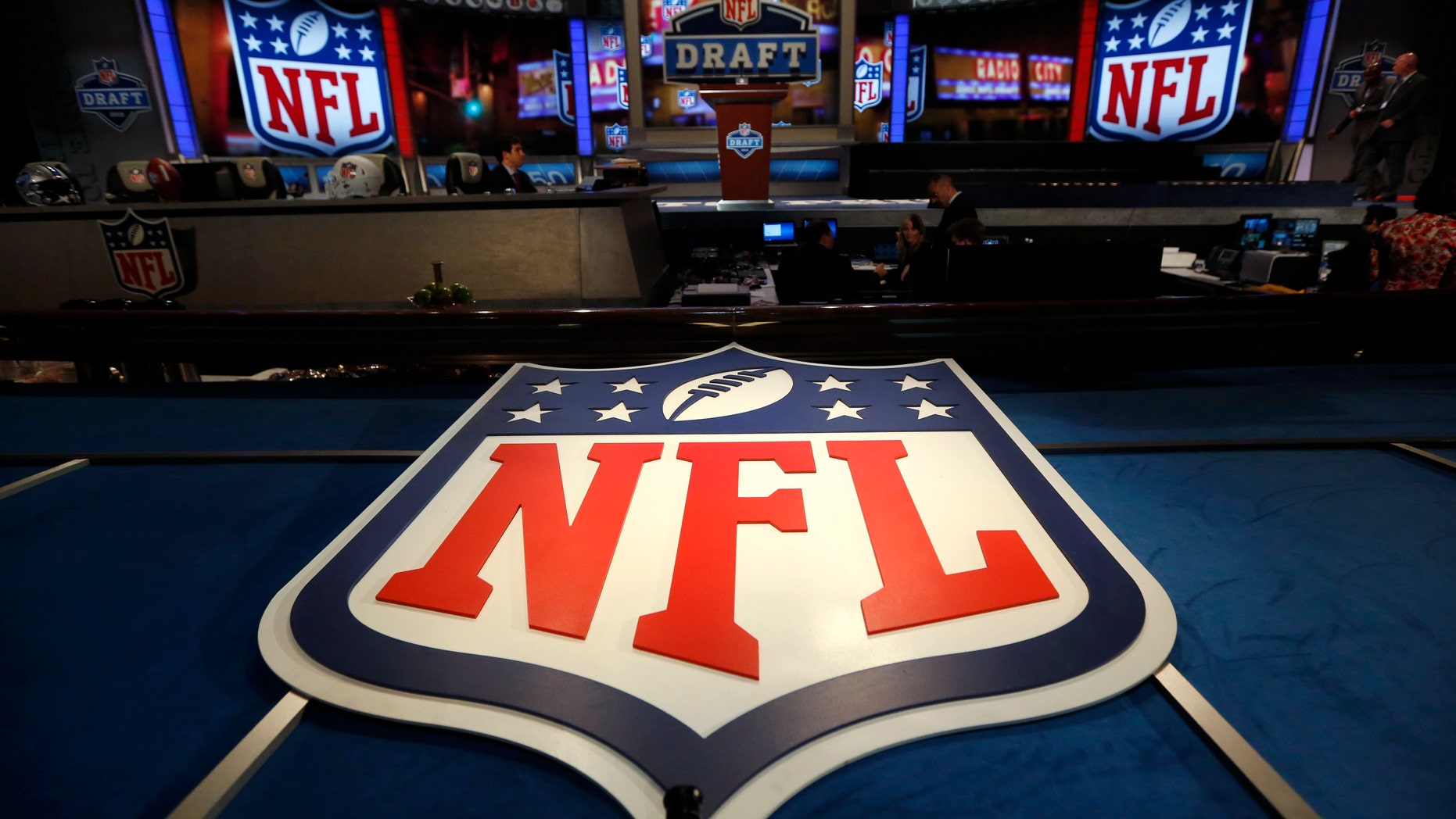 File photo - The NFL logo and set are seen at New York's Radio City Music Hall before the start of the 2013 NFL Draft April 25, 2013.