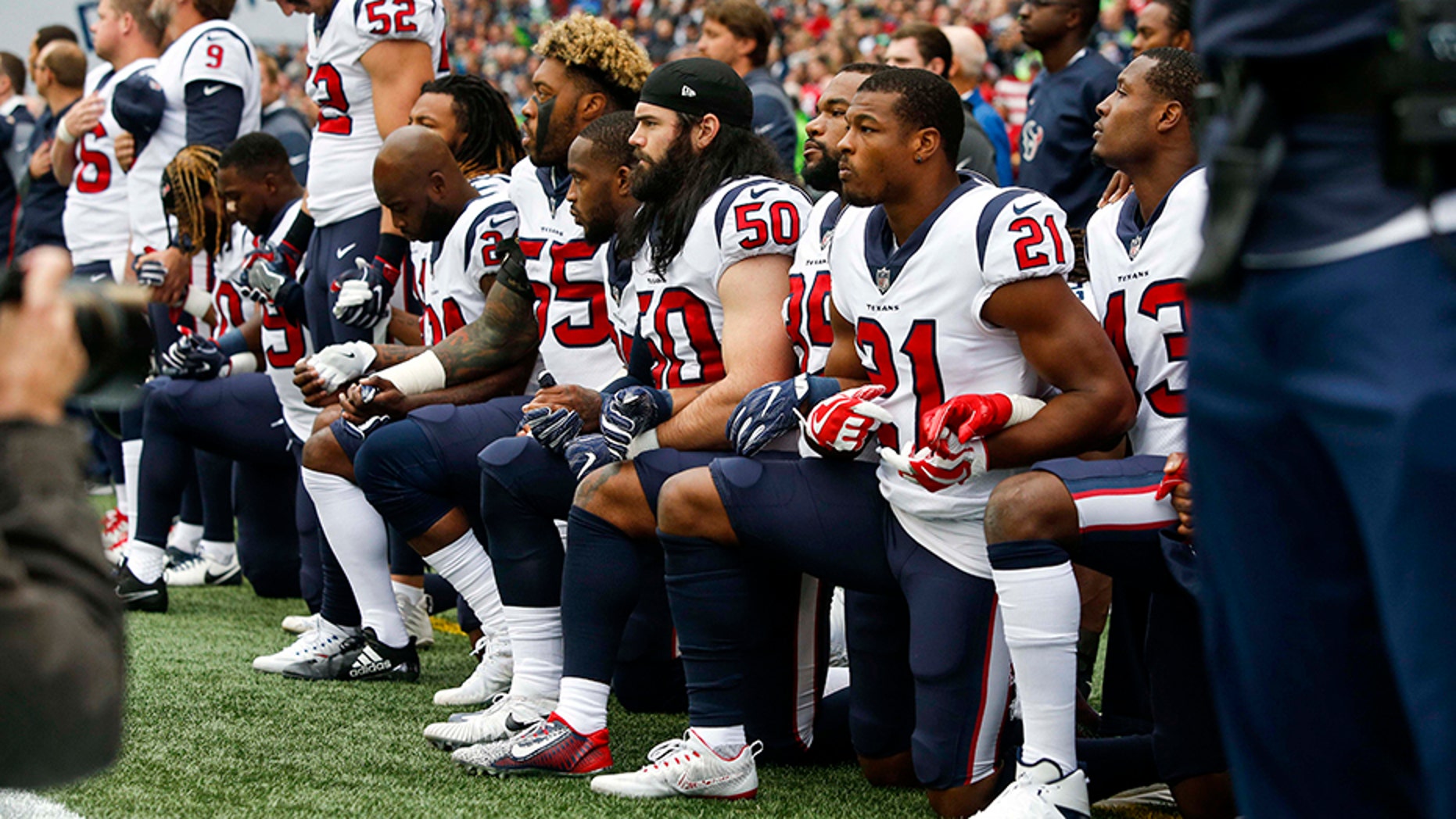 Several players from the Houston Texans seen kneeling during the national anthem in 2017.