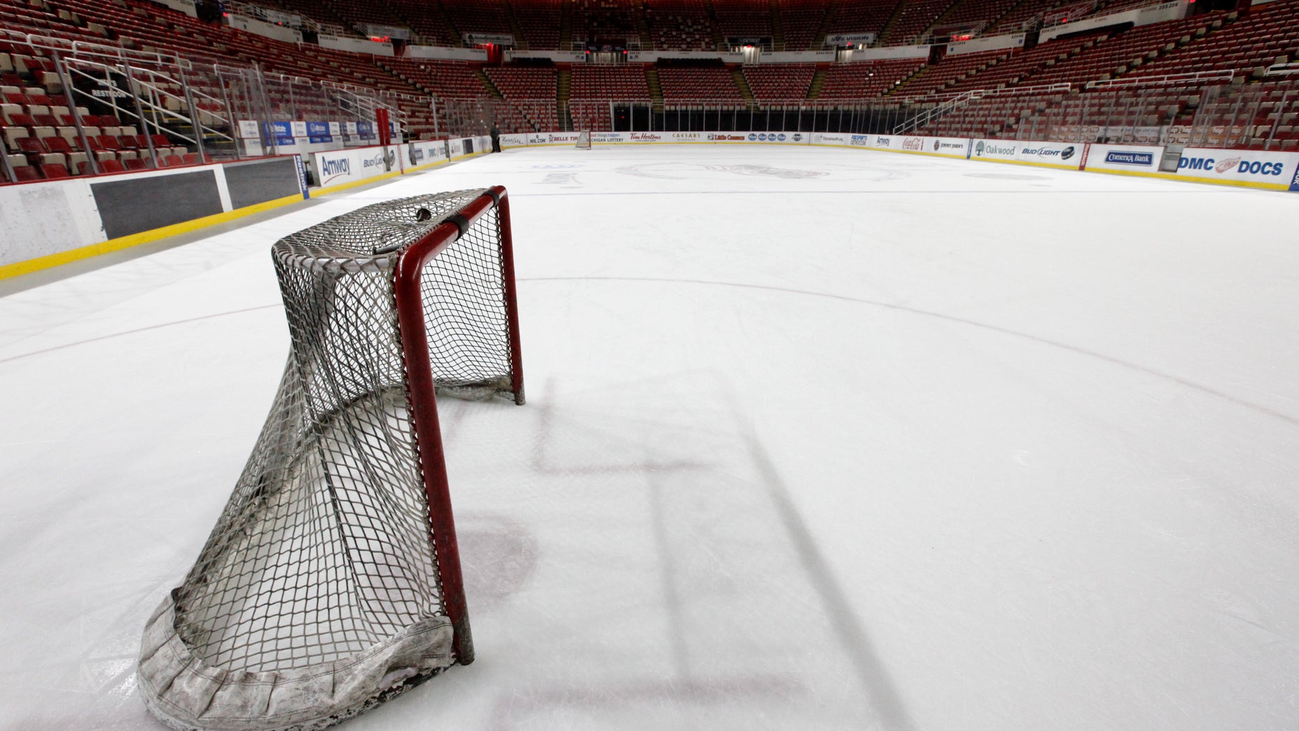Dec. 18, 2012: A hockey goal sits on the ice at Joe Louis Arena home of the Detroit Red Wings hockey club in Detroit. The NHL lockout that's already wiped out the first three months of the season is taking its toll on small businesses in many of the NHL's markets.