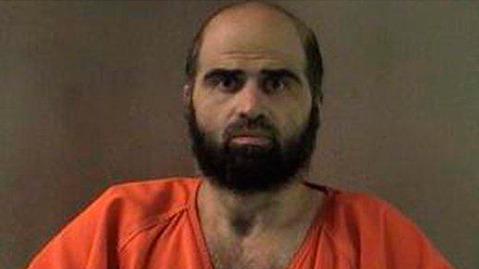 FILE: Nidal Hasan has been charged with killing 13 people and wounding 31 in a November 2009 shooting spree at Fort Hood.