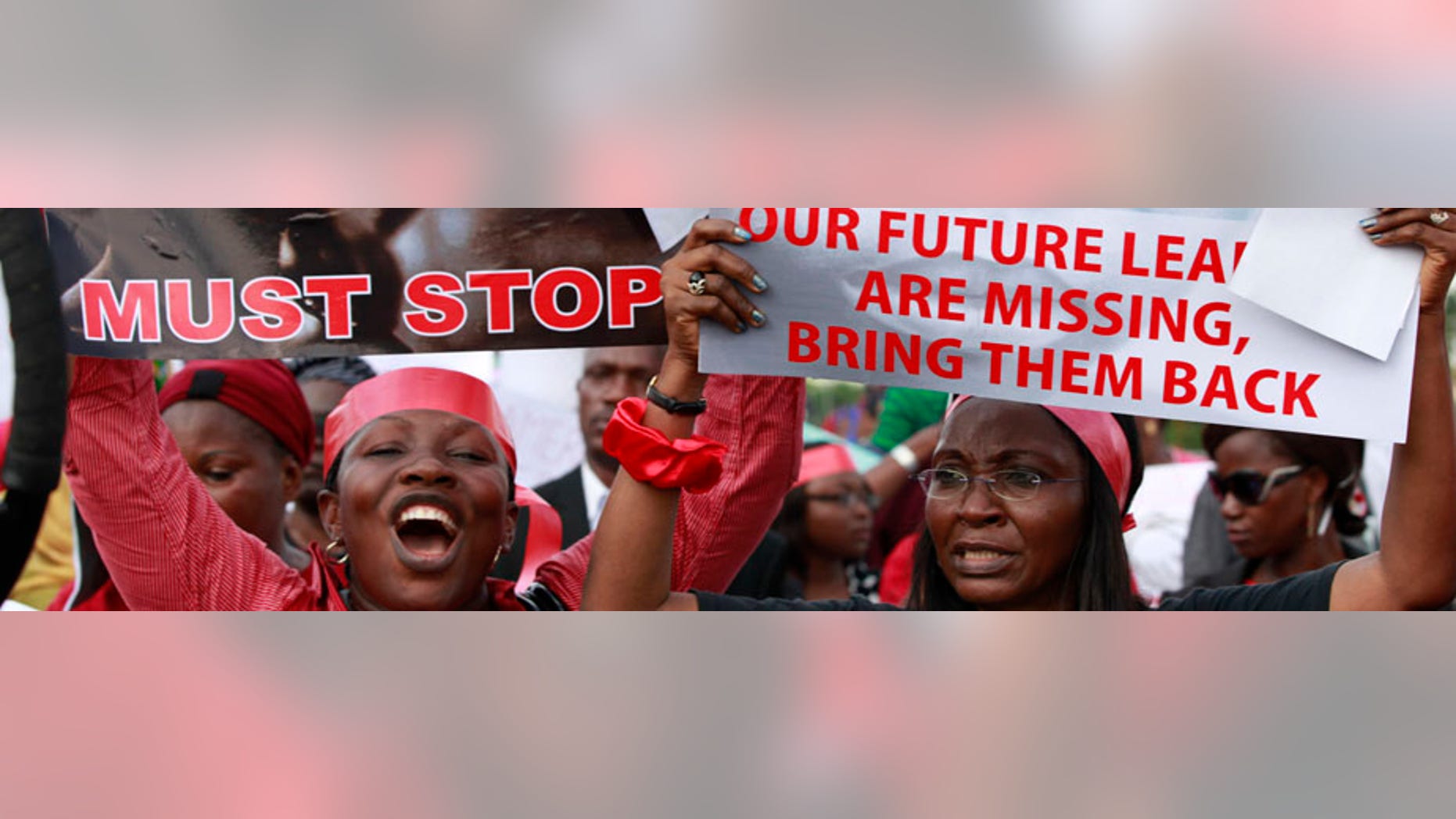 Women attend a demonstration calling on the government to rescue kidnapped school girls of a government secondary school Chibok, in Lagos, Nigeria, Monday May 5, 2014. Their plight and the failure of the Nigerian military to find them has drawn international attention to an escalating Islamic extremist insurrection that has killed more than 1,500 so far this year. Boko Haram, the name means "Western education is sinful," has claimed responsibility for the mass kidnapping and threatened to sell the girls. The claim was made in a video seen Monday. The British and U.S. governments have expressed concern over the fate of the missing students, and protests have erupted in major Nigerian cities and in New York. (AP Photo/Sunday Alamba)