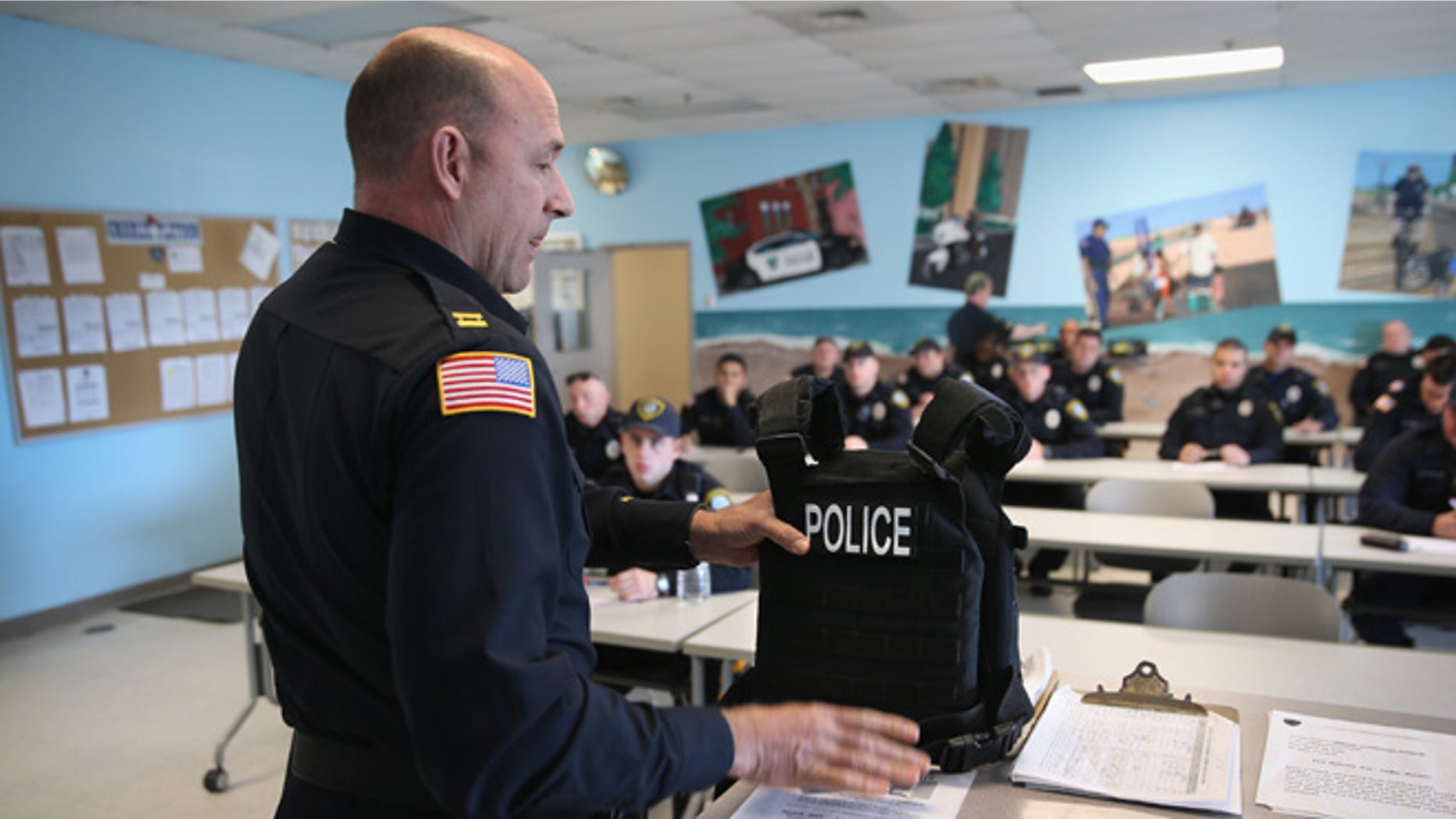 ATLANTIC CITY, NEW JERSEY - MARCH 30: Atlantic City police captain Chris Kammerman shows off new protective vests donated to the police department on March 30, 2016 in Atlantic City, New Jersey. The Atlantic City municipality is due to run out of funds on April 8 and is facing insolvency and the possibility of bankruptcy. Many city workers, including the police and firemen, have vowed to continue working without pay until funds are restored. The Jersey Shore gambling resort town has seen four casinos close in recent years, cutting its casino tax revenue in half. The financial crisis has pitted Atlantic City Mayor Don Guardian against New Jersey Governor Chris Christie, who has refused to bail out Atlantic City with state funds. (Photo by John Moore/Getty Images)