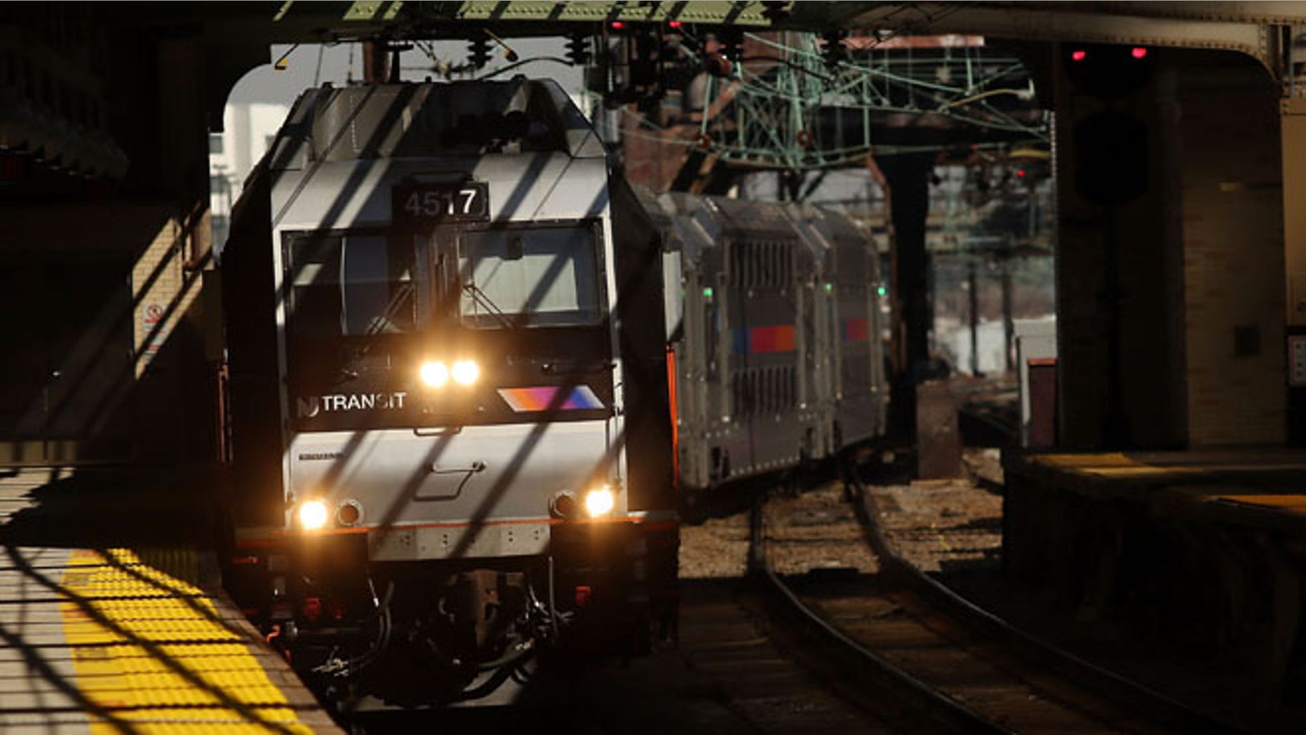 NEWARK, NJ - MARCH 09: A NJ Transit train pulls into a station as a strike looms on one of the nations most popular commuter lines on March 9, 2016 in Newark, New Jersey. The employee unions, which have been without a contract since 2011, are threatening to strike , will resume talks with management on Thursday while a strike could take place as early as Monday morning. (Photo by Spencer Platt/Getty Images)