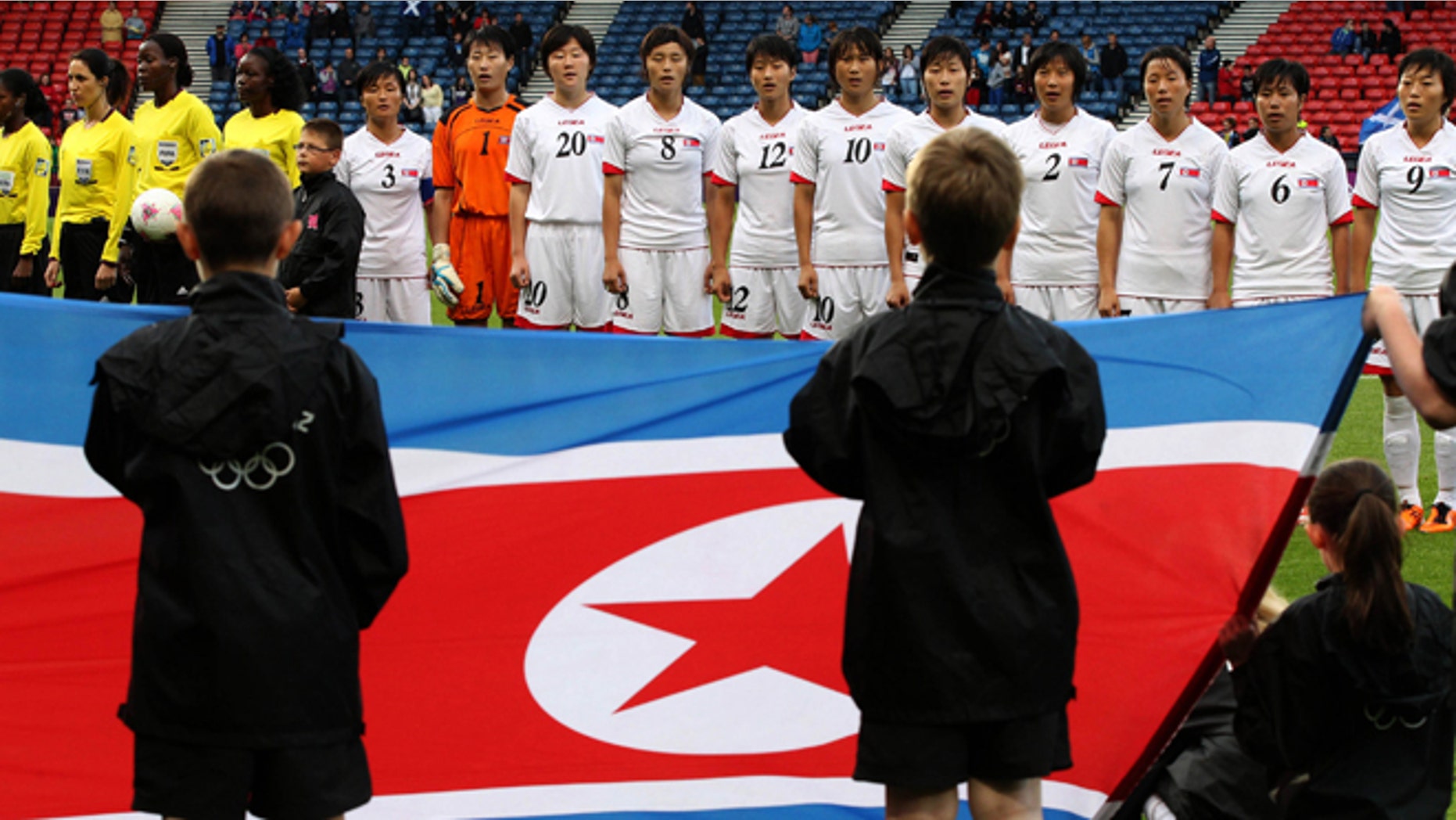 July 28, 2012: The North Korean women's soccer team line up before their group G match against France at the London 2012 Summer Olympics, at Hampden Park Stadium in Glasgow, Scotland.