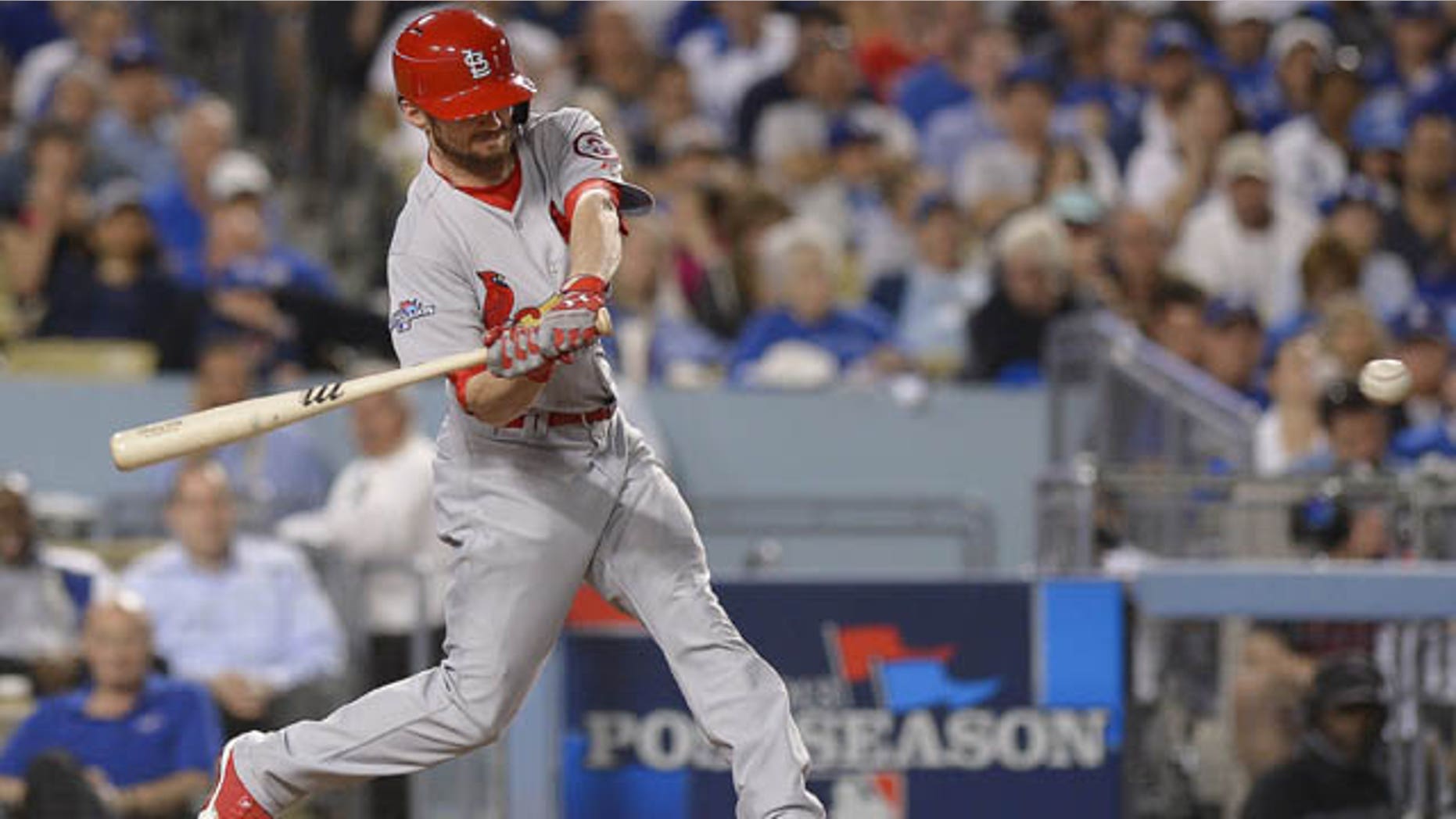 October 15, 2013: St. Louis Cardinals' Shane Robinson hits a home run during the seventh inning of Game 4 of the National League baseball championship series against the Los Angeles Dodgers Tuesday. (AP Photo/Mark J. Terrill)