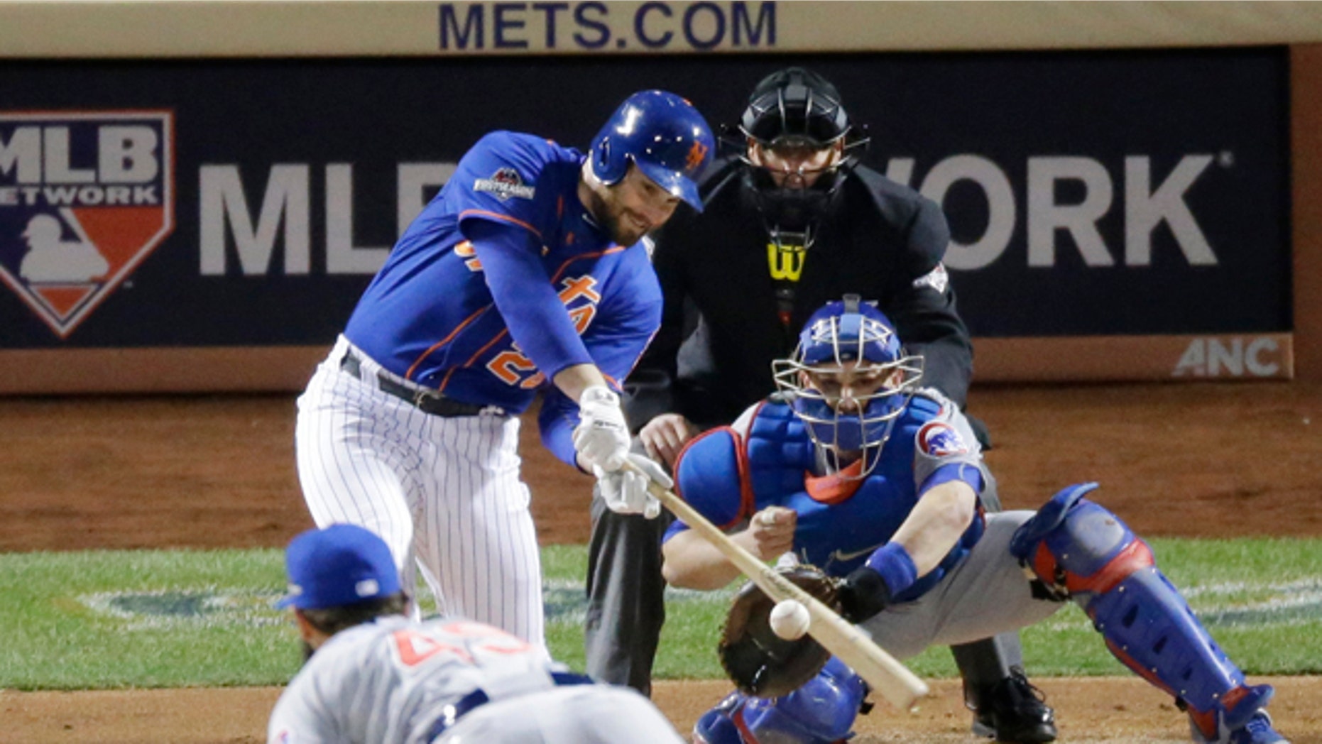 Oct. 18, 2015: New York Mets' Daniel Murphy hits a two-run home run during the first inning of Game 2 of the National League baseball championship series against the Chicago Cubs in New York. (AP Photo/David Goldman)