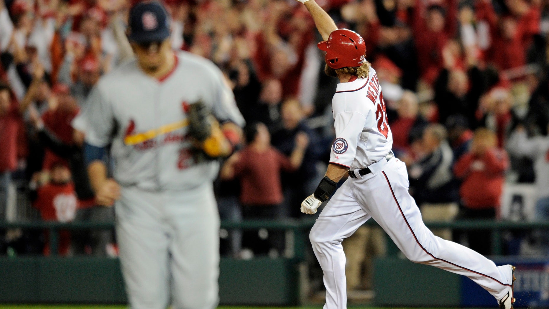 Oct. 11, 2012: Washington Nationals' Jayson Werth, right, reacts as he rounds the bases after hitting the game-winning solo home run in the ninth inning of Game 4 of the National League division baseball series against the St. Louis Cardinals in Washington. Washington won 2-1.